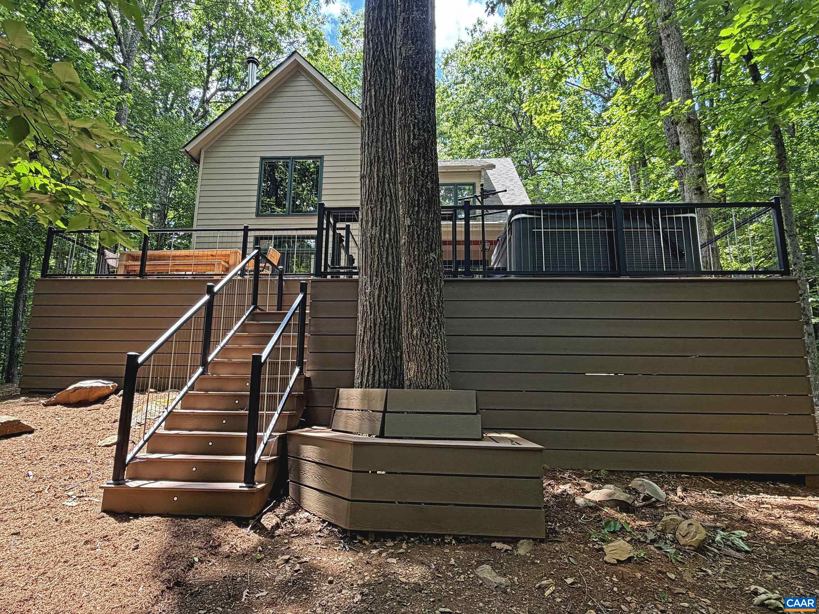The backyard offers a wonderful space for both kids and adults to relax, play, and enjoy the outdoors. The backyard offers a wonderful space for both kids and adults to relax, play, and enjoy the outdoors.