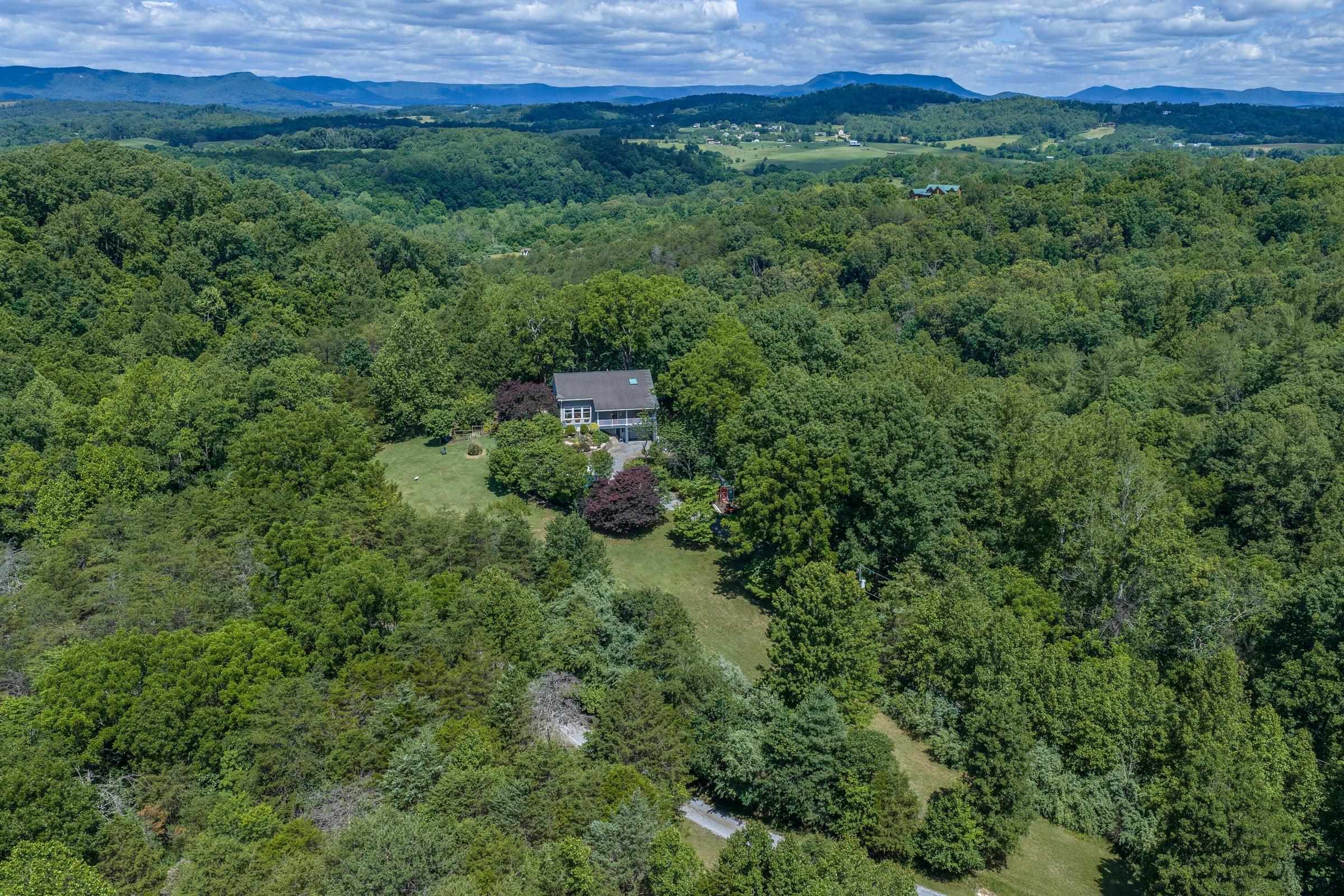 Nestled among lush greenery . Nestled among lush greenery .
