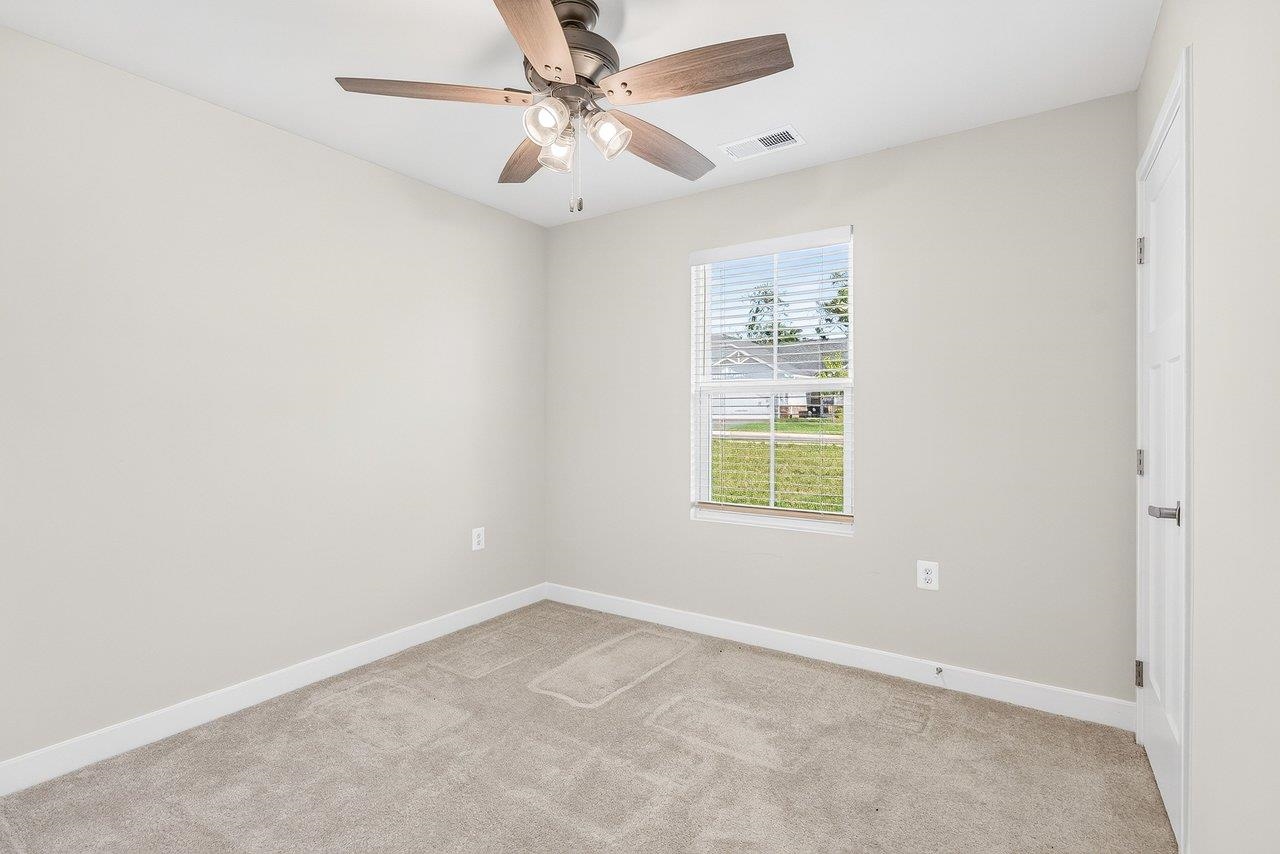 *has carpet and a ceiling fan *has carpet and a ceiling fan