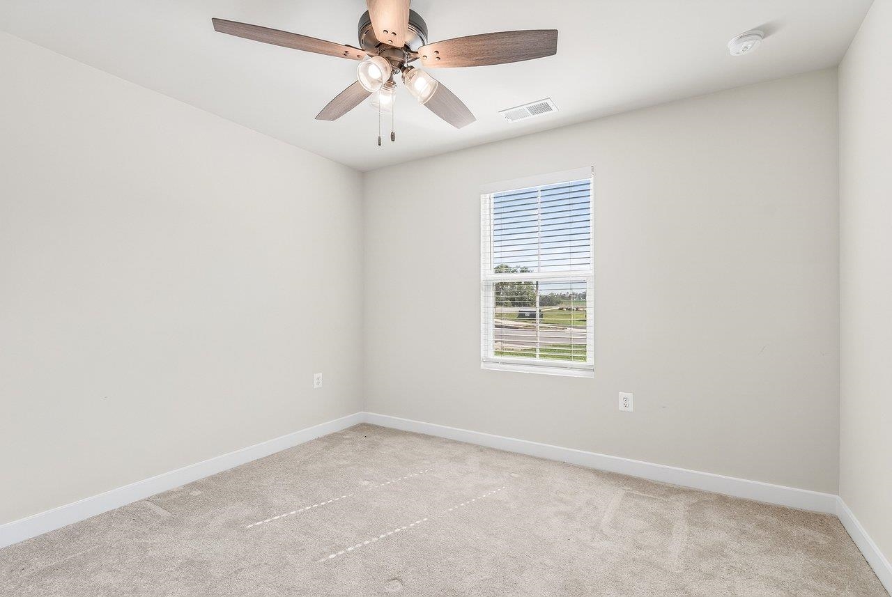 *has carpet and a ceiling fan *has carpet and a ceiling fan