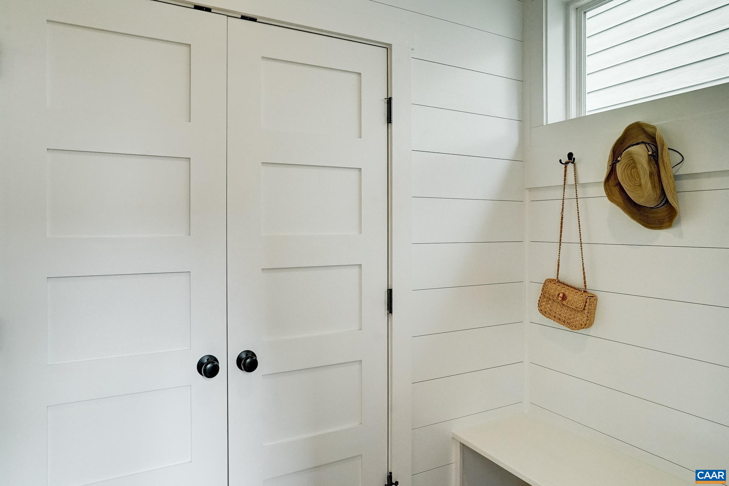 Large coat closet in mudroom. Large coat closet in mudroom.