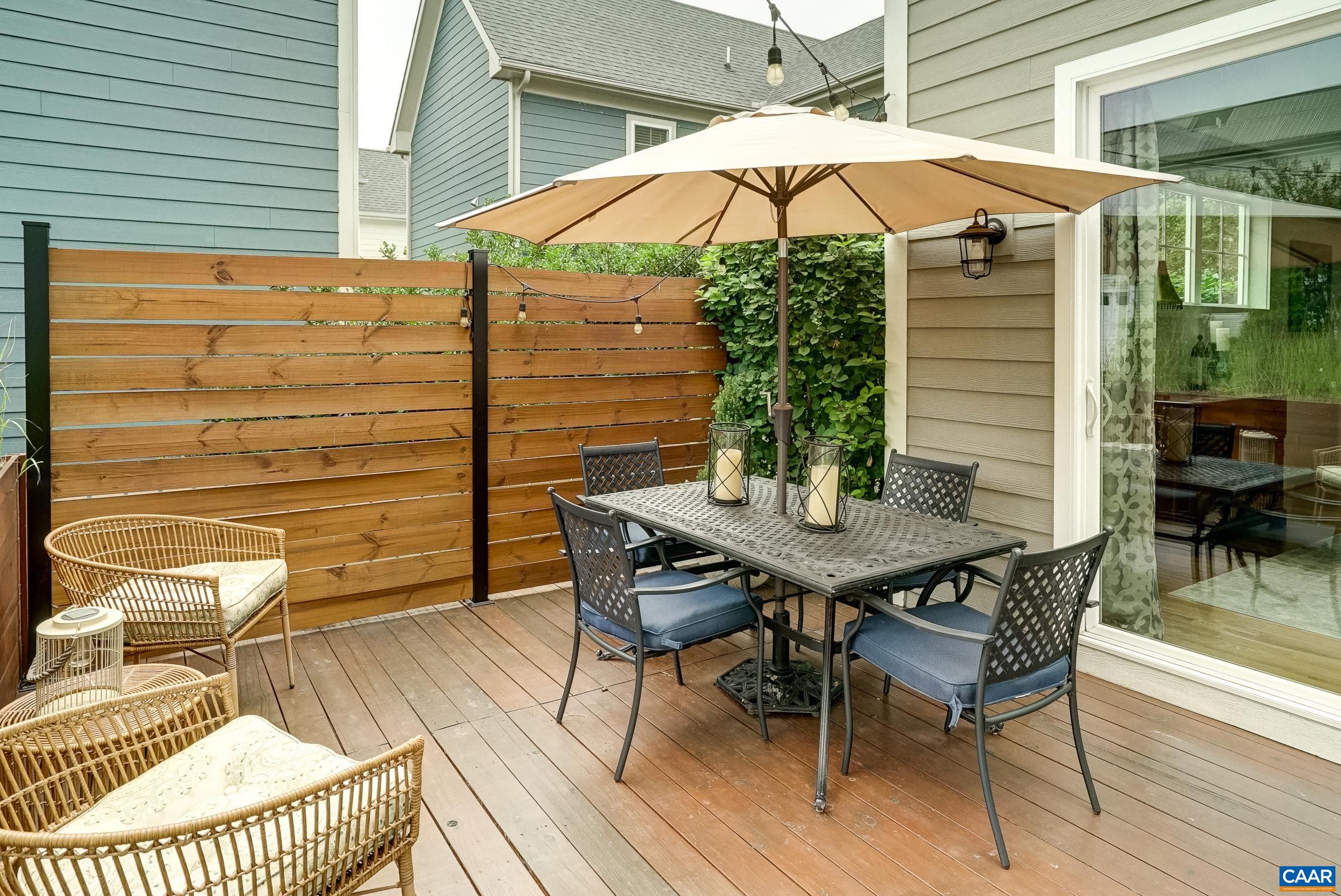 Lovely outdoor deck with privacy fence. Lovely outdoor deck with privacy fence.