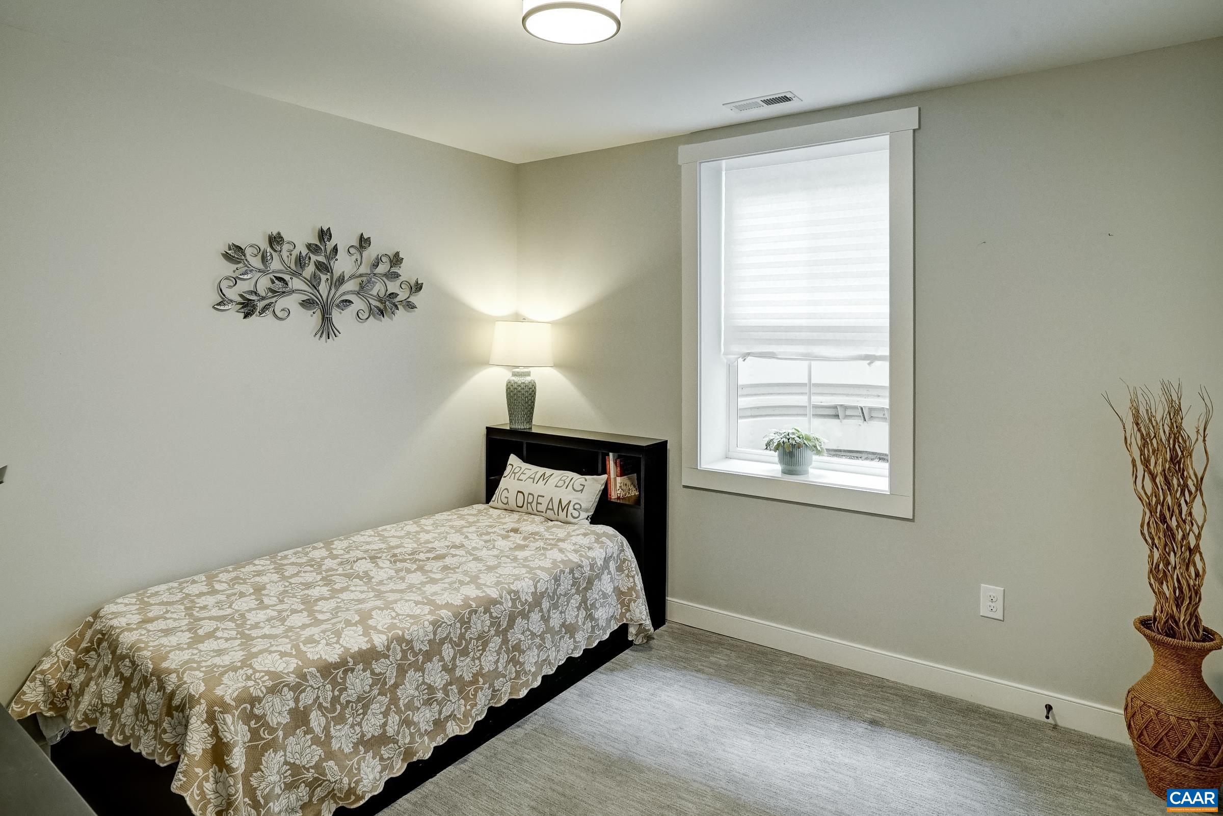 Bedroom 4 in basement - great for guests! Bedroom 4 in basement - great for guests!
