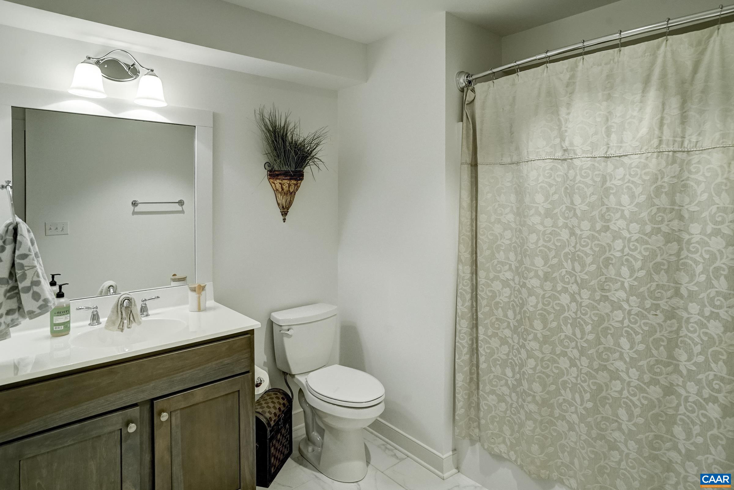 Spacious full bathroom in basement. Spacious full bathroom in basement.