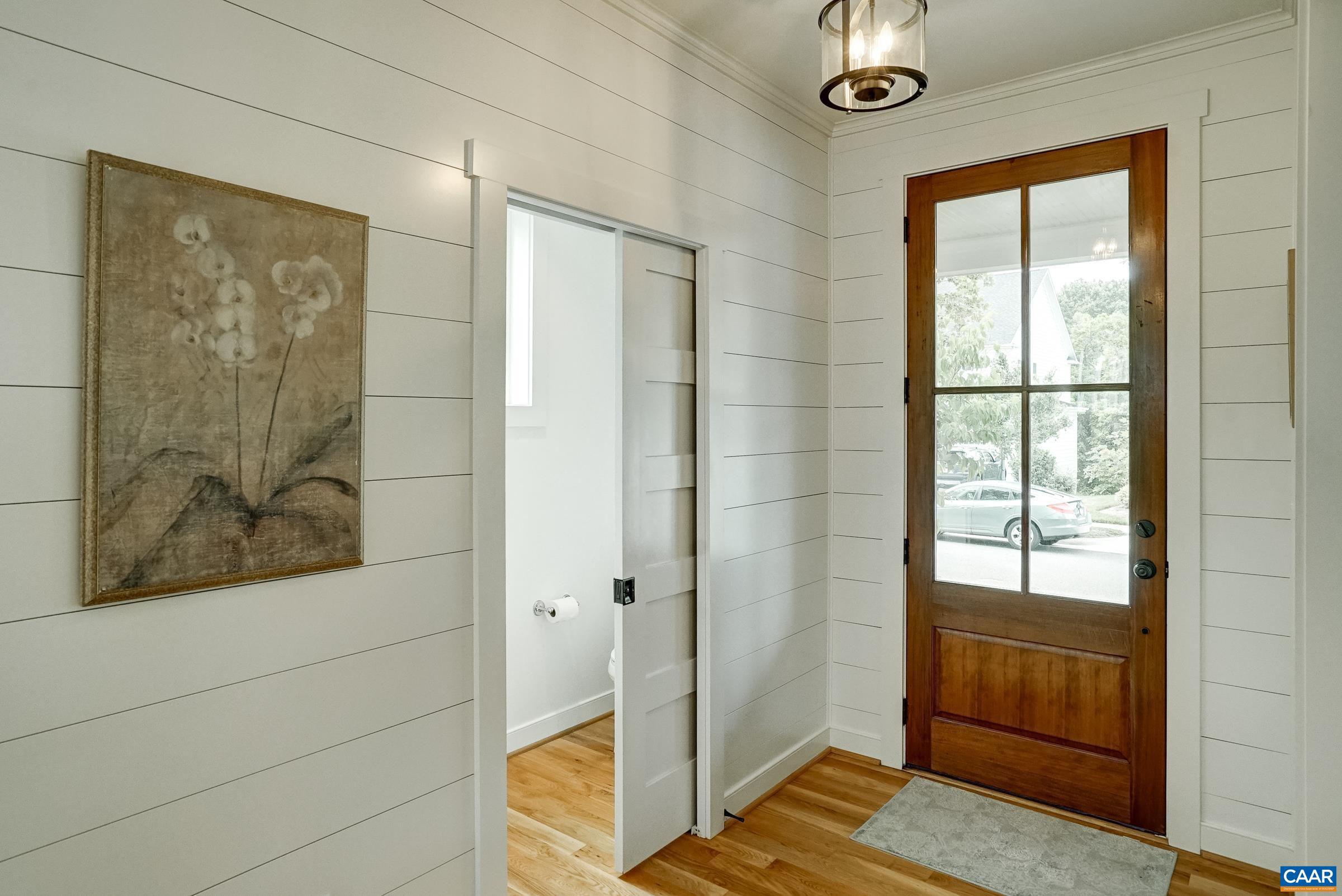 White oak hardwood floors throughout the main level. White oak hardwood floors throughout the main level.