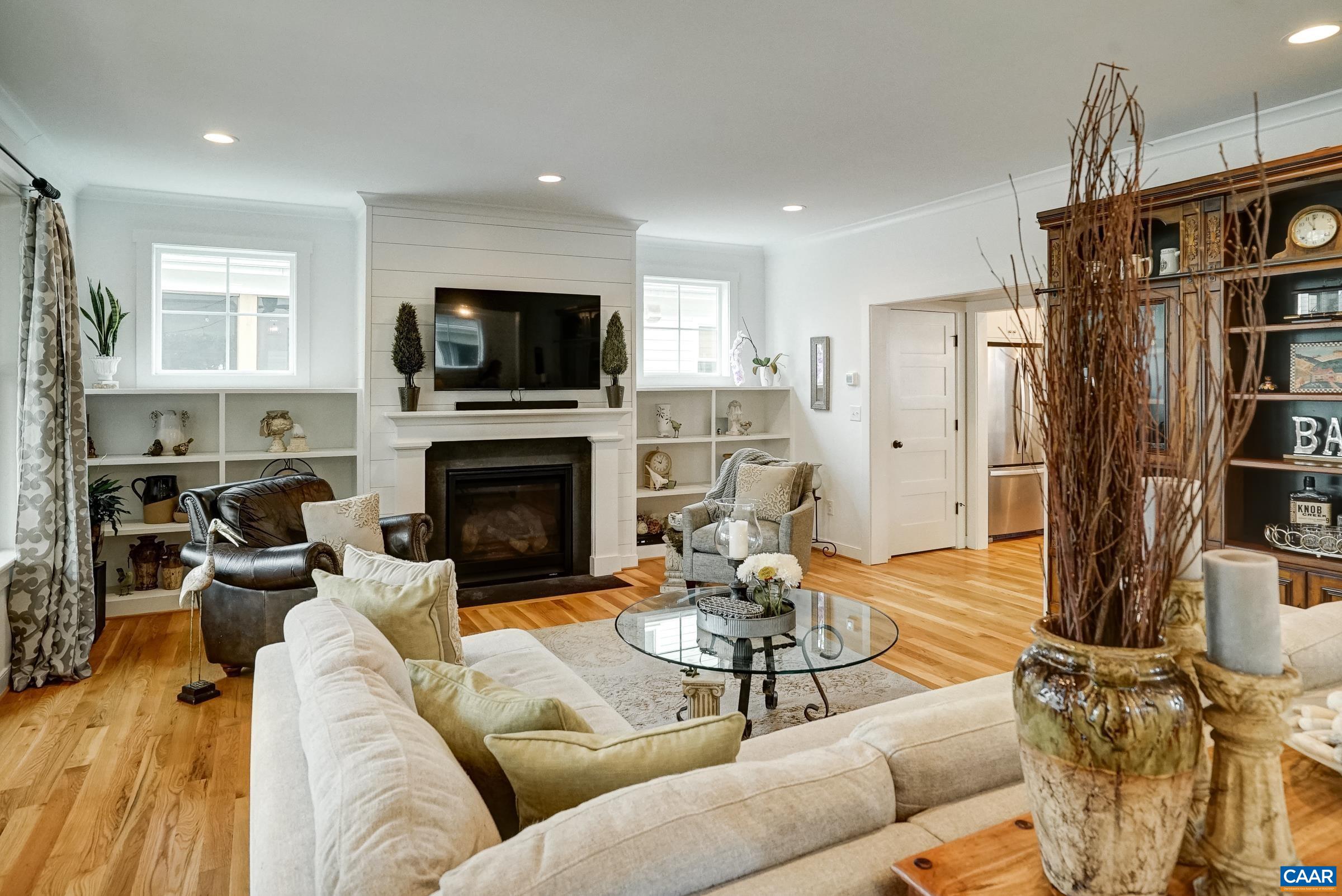 Gas fireplace with built-in bookshelves in the living room. Gas fireplace with built-in bookshelves in the living room.