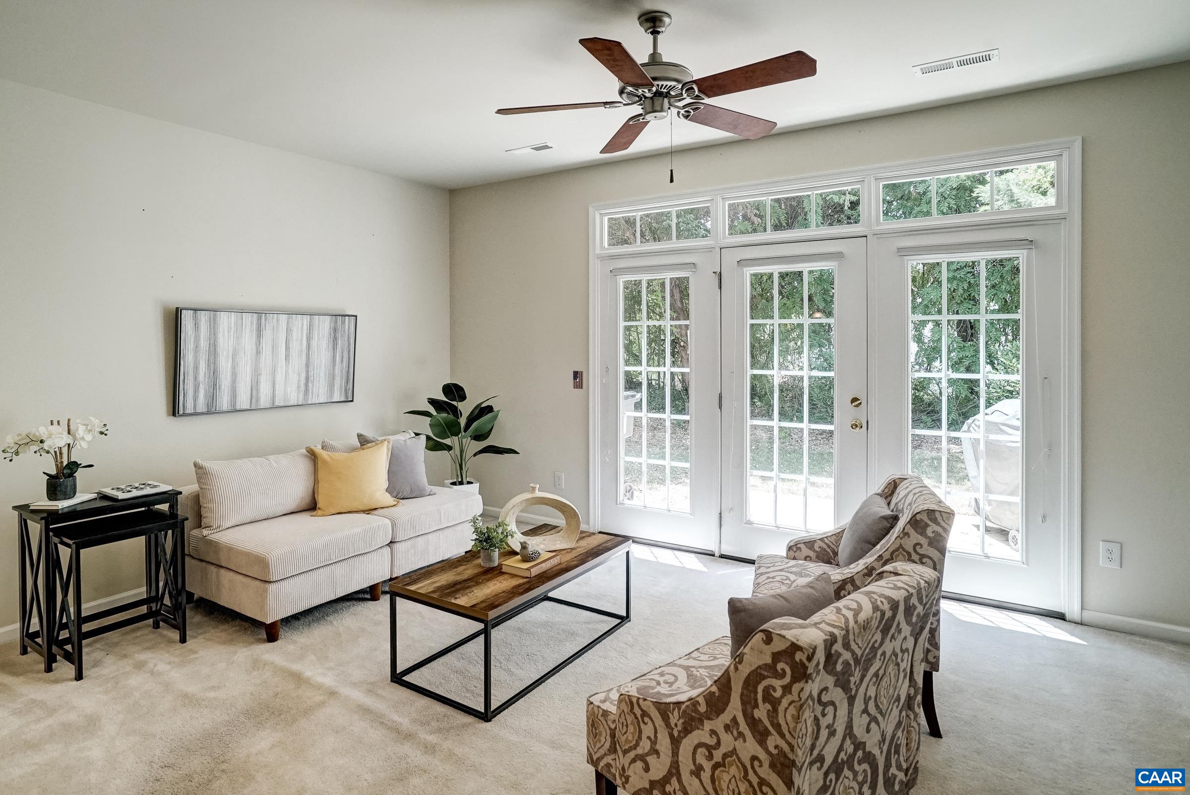Living room with ceiling fan. Living room with ceiling fan.