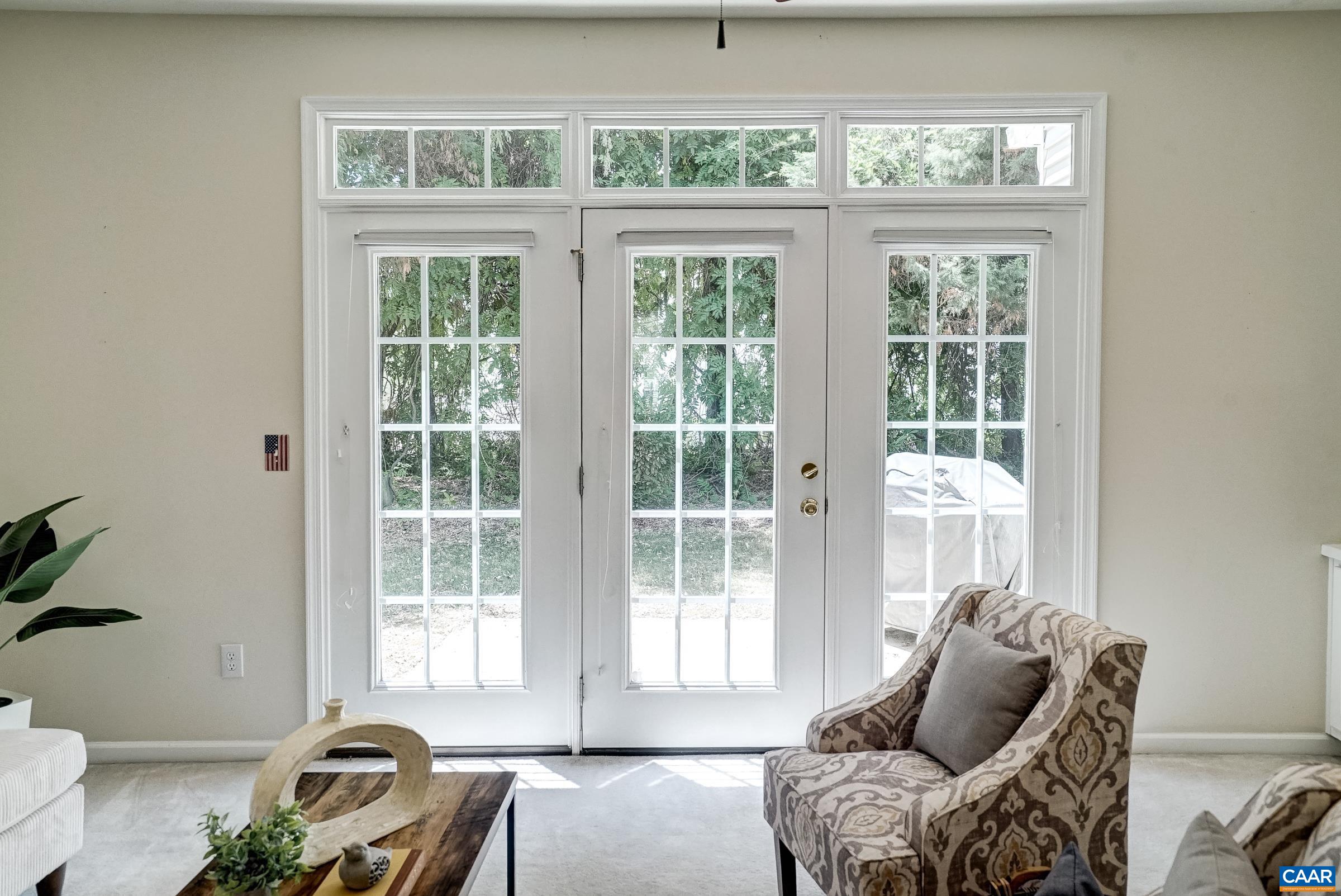 Wide French doors lead to private patio Wide French doors lead to private patio