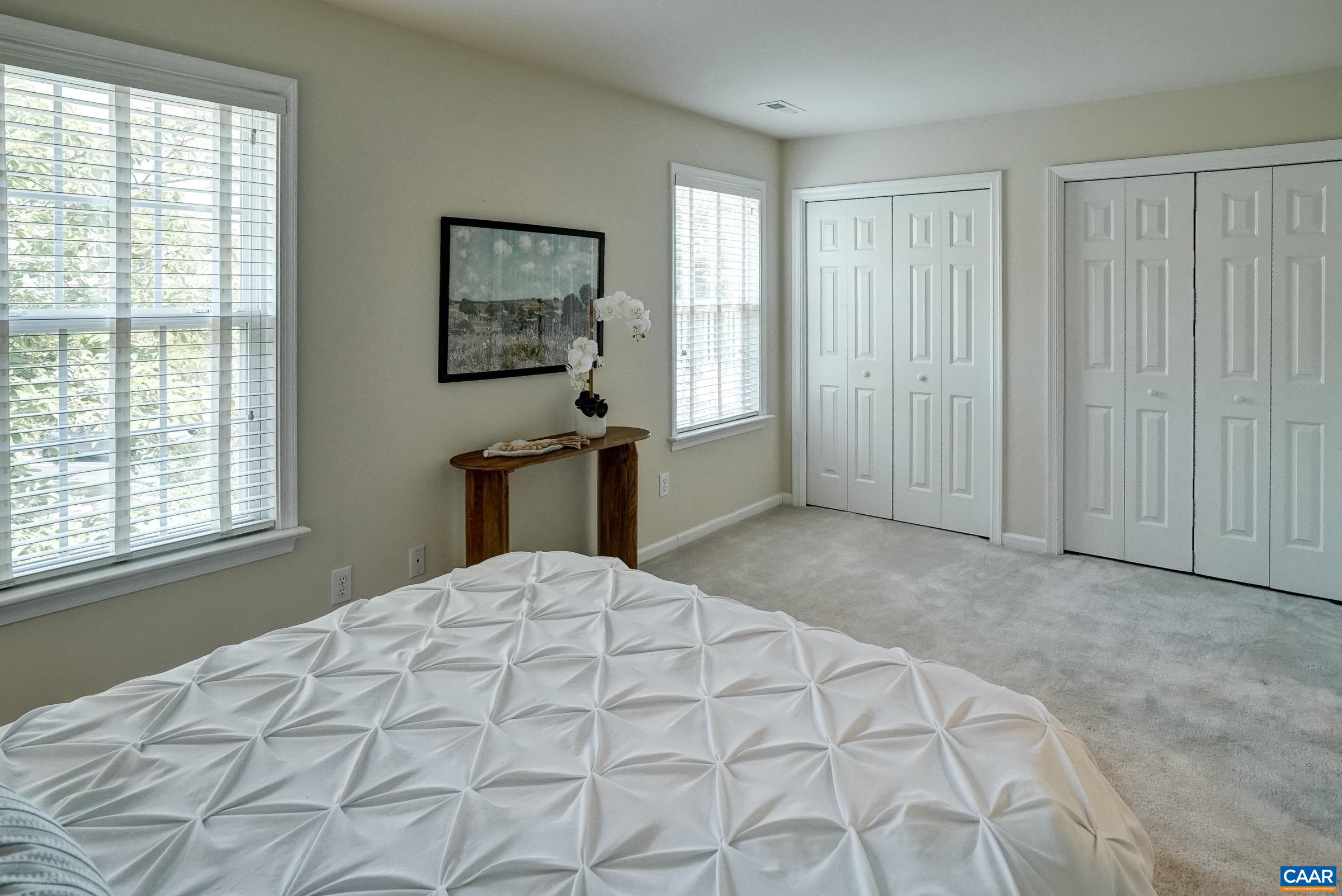 Primary bedroom with two large closets. Primary bedroom with two large closets.