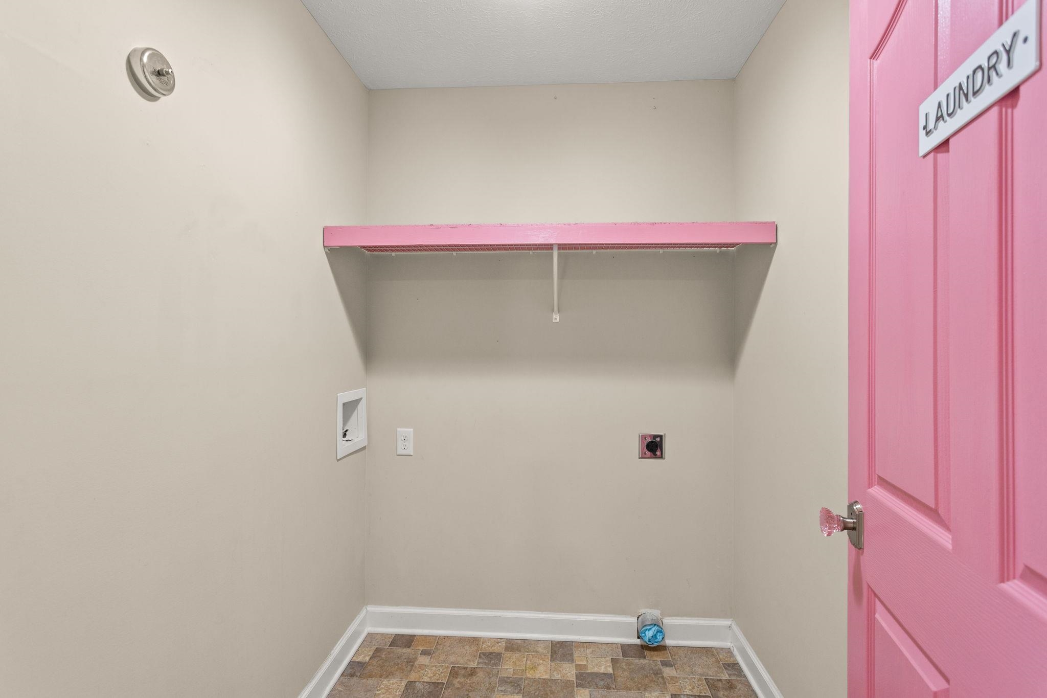 located at end of hall at top of steps. located at end of hall at top of steps.