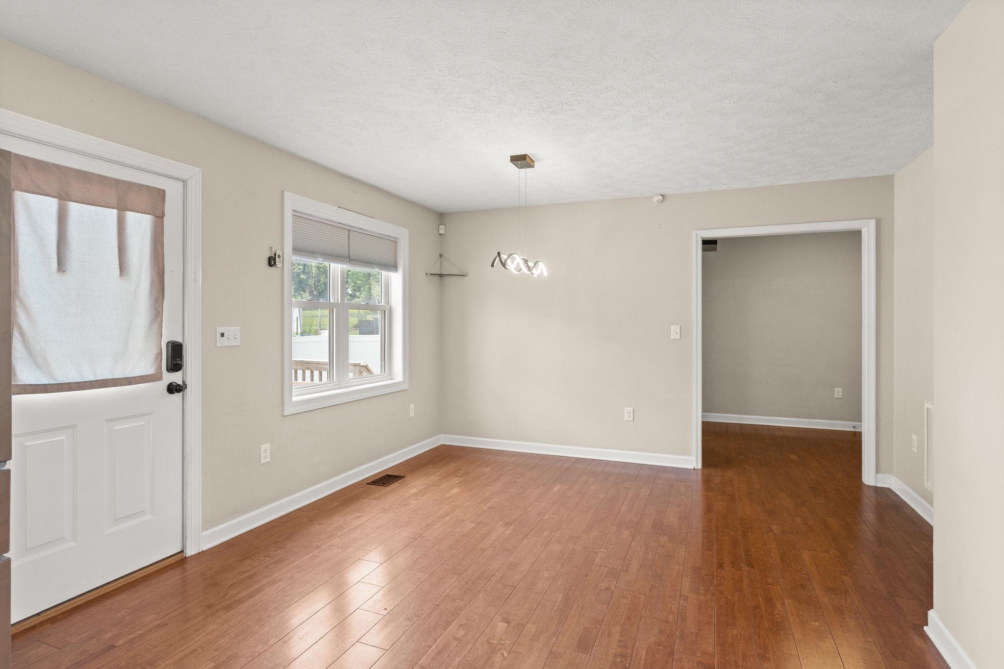 with access to rear deck, mud room or will host a wide hall tree. with access to rear deck, mud room or will host a wide hall tree.