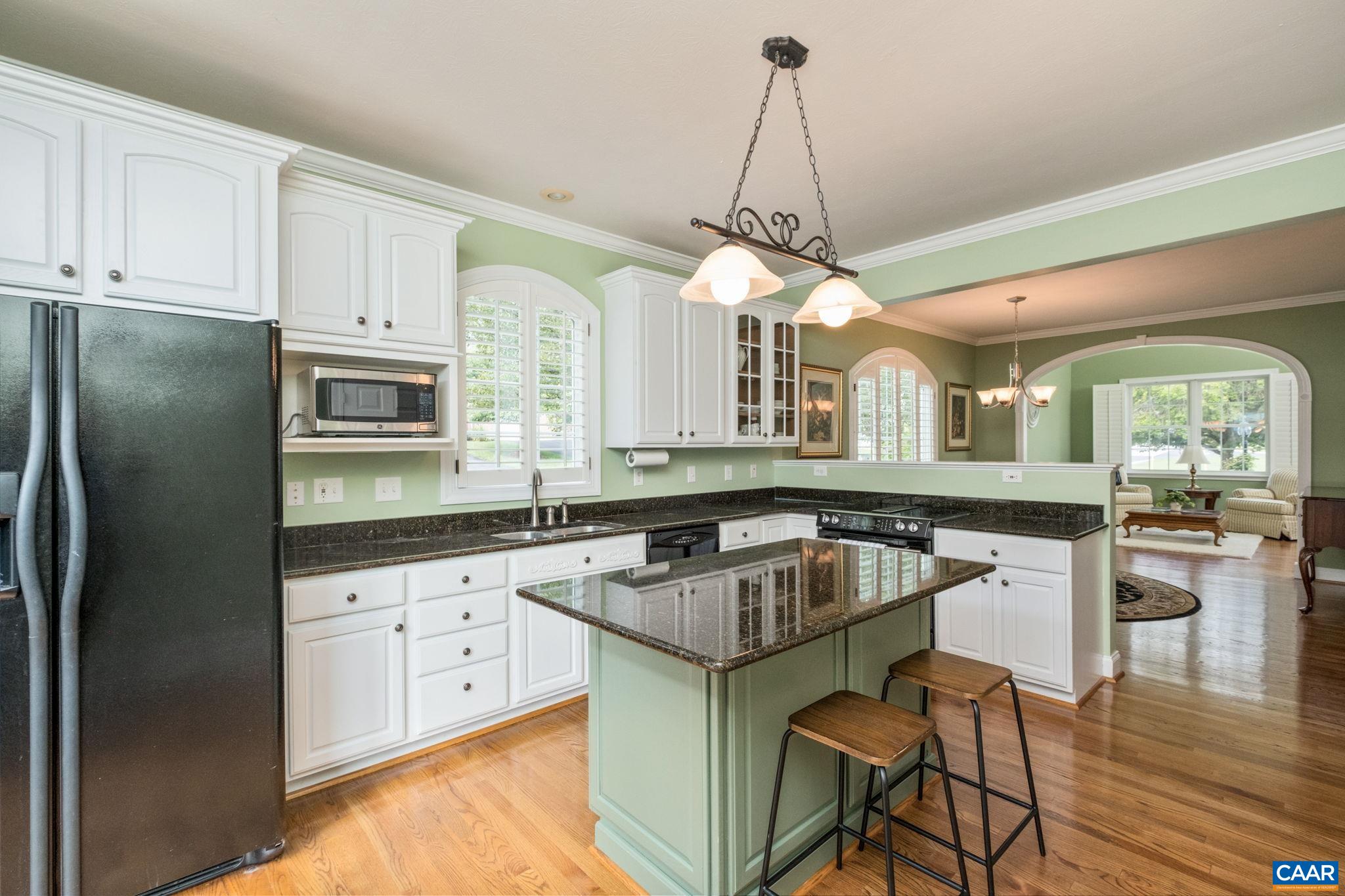 View of the kitchen toward the great room. View of the kitchen toward the great room.