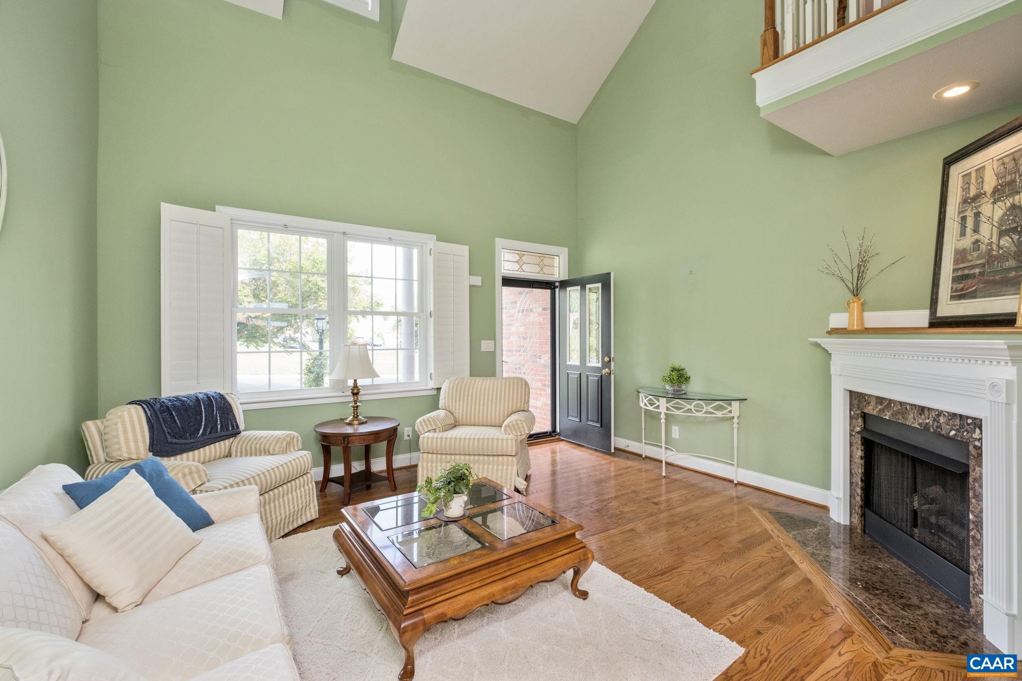 Gleaming hardwood floors welcome you into the great room with vaulted ceiling. Gleaming hardwood floors welcome you into the great room with vaulted ceiling.