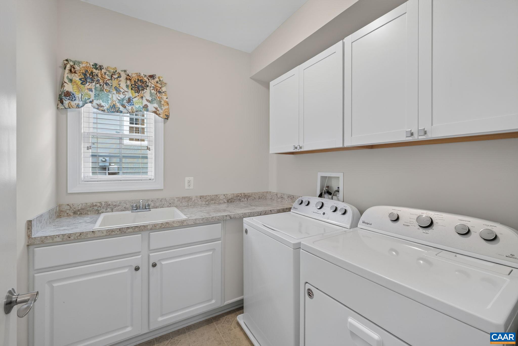 The large utility sink and laundry cabinets are a nice upgrade. The large utility sink and laundry cabinets are a nice upgrade.