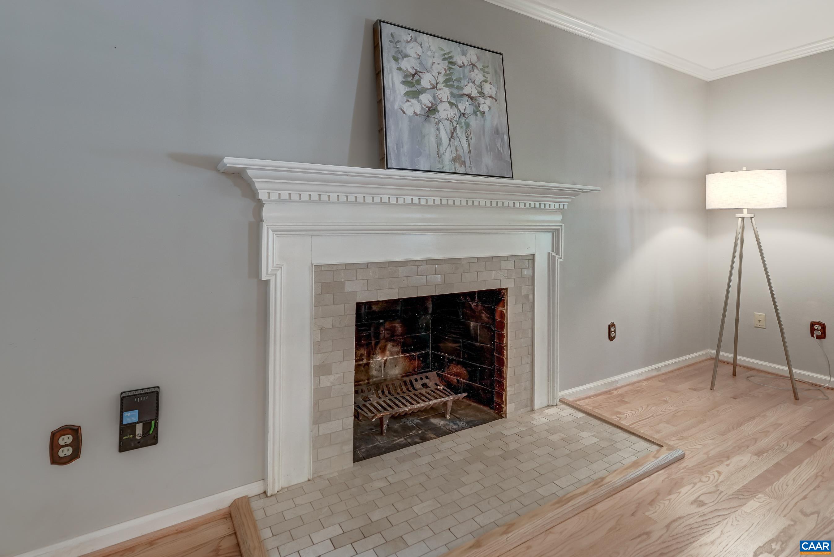 Updated wood burning fireplace. Updated wood burning fireplace.