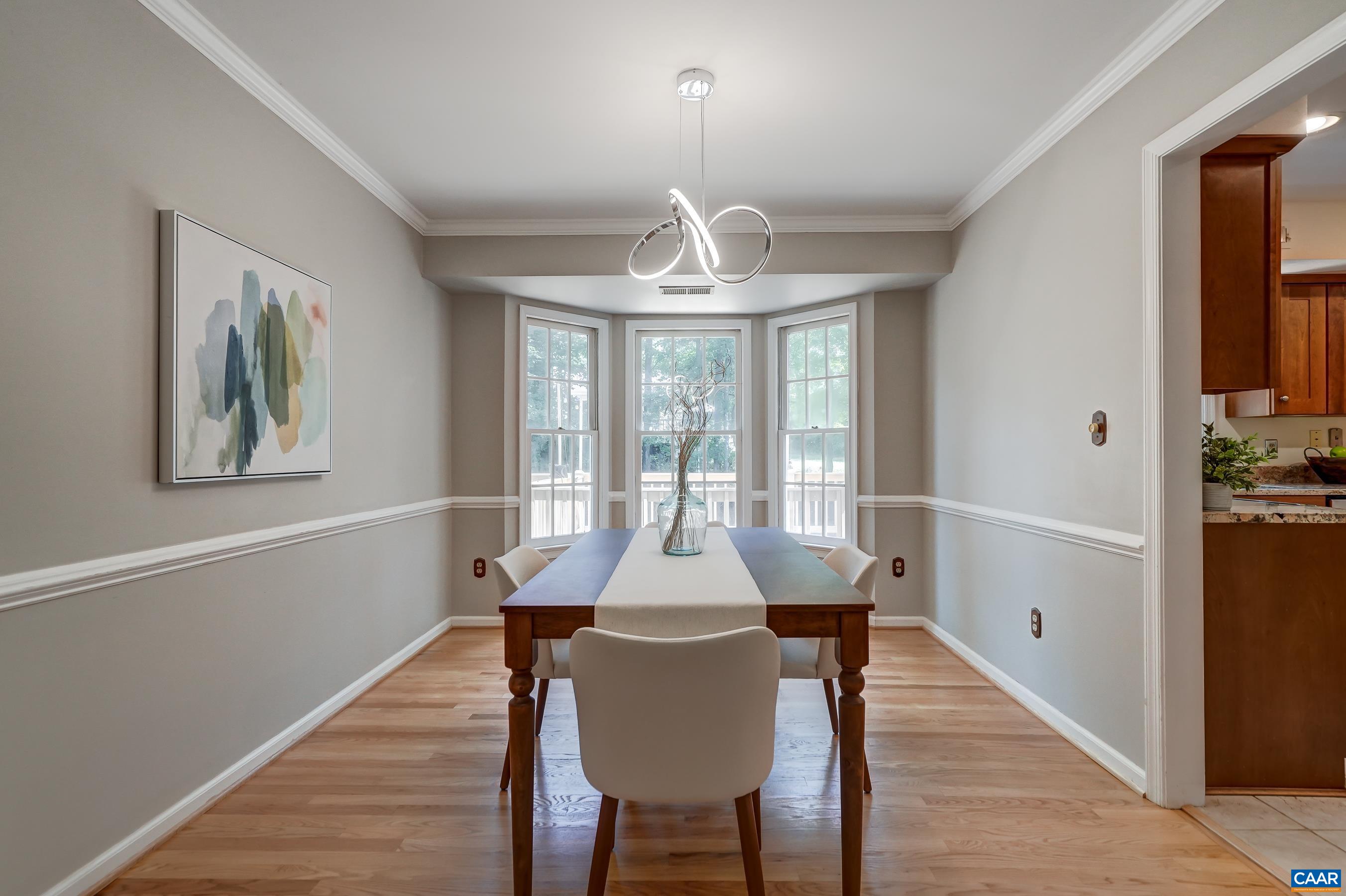 Dining room with bay window. Dining room with bay window.