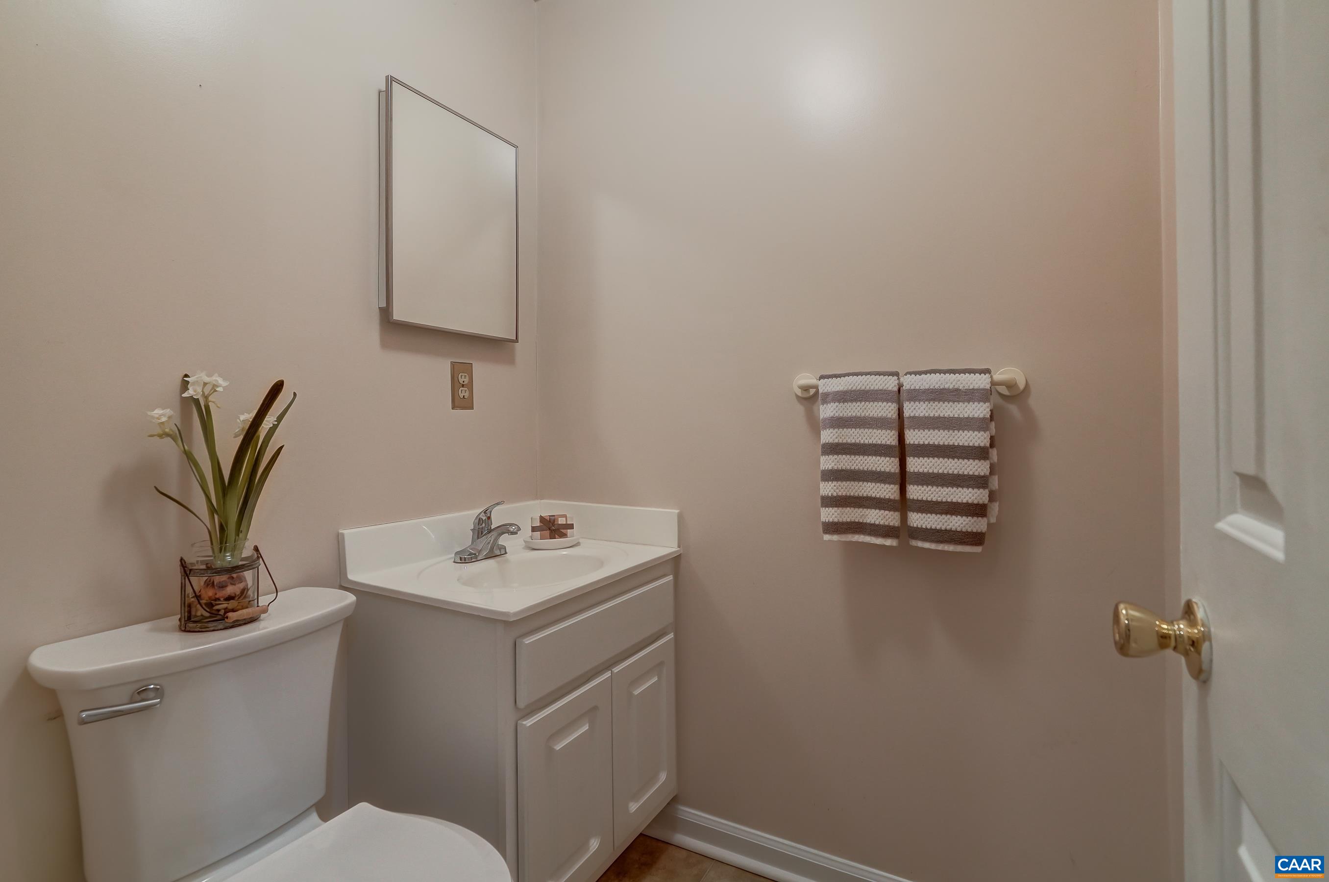 Half bathroom on lower level. Half bathroom on lower level.