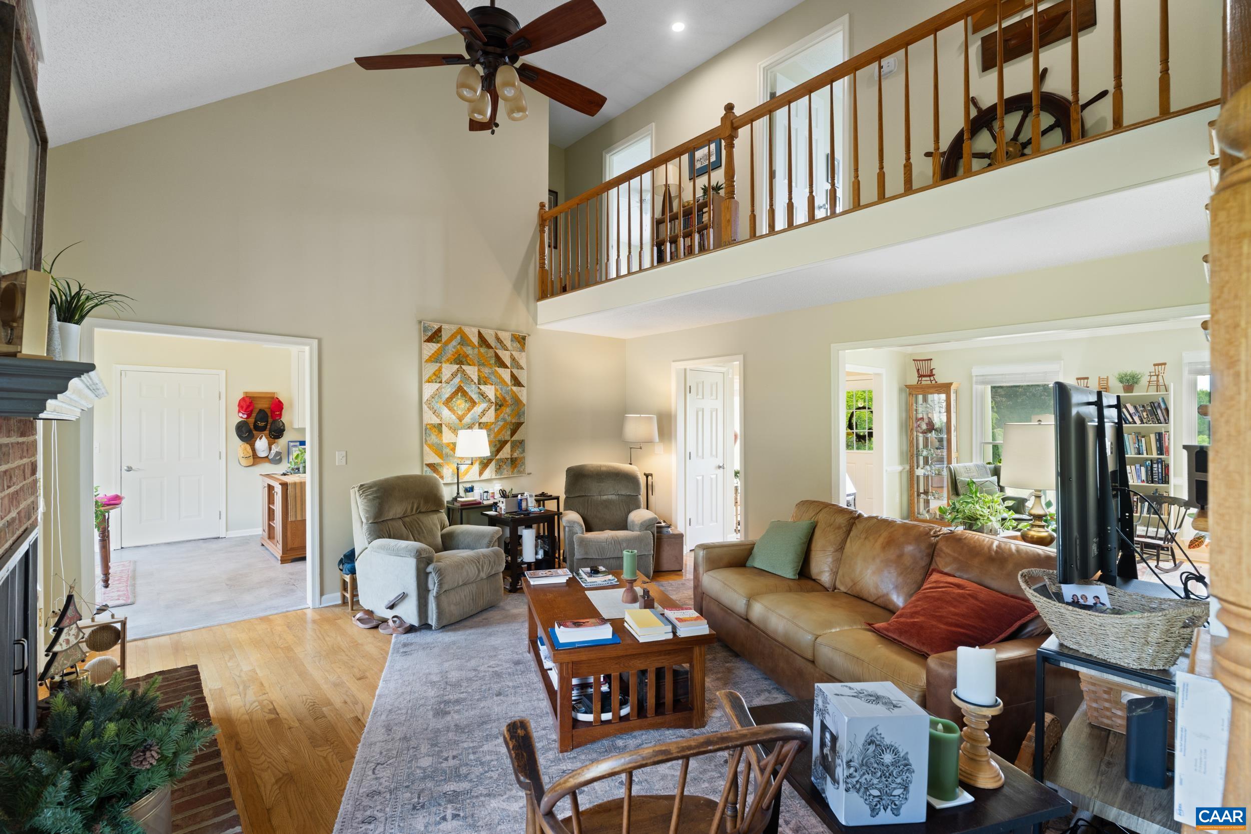Family room with upstairs balcolny Family room with upstairs balcolny