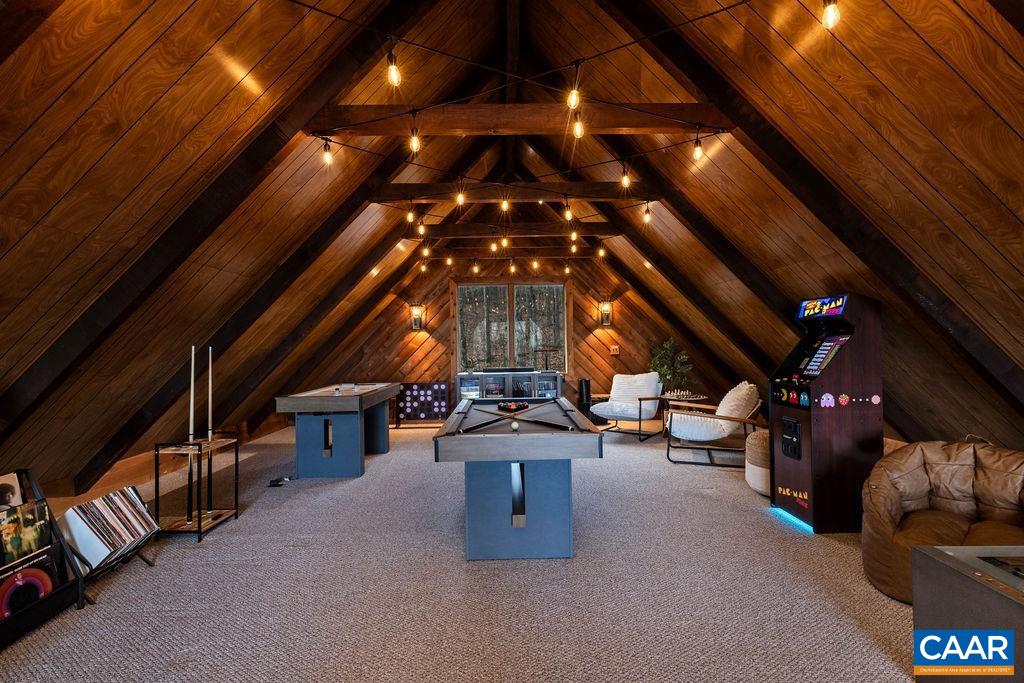 This impressive loft has been converted into a fantastic game/ rec area. This impressive loft has been converted into a fantastic game/ rec area.