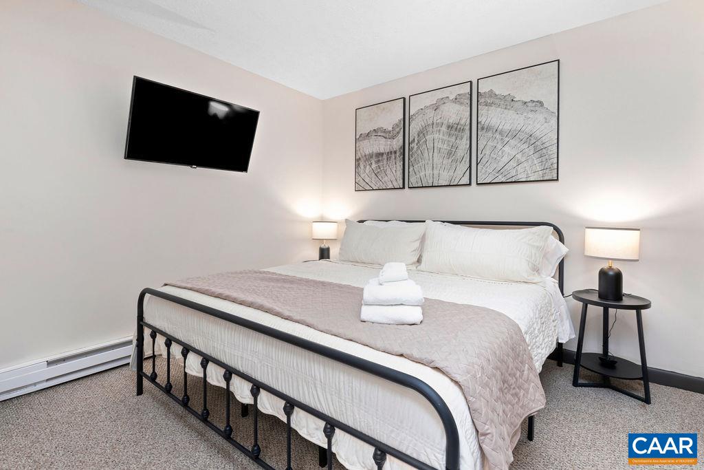 One of the three bedrooms on the lower level. One of the three bedrooms on the lower level.