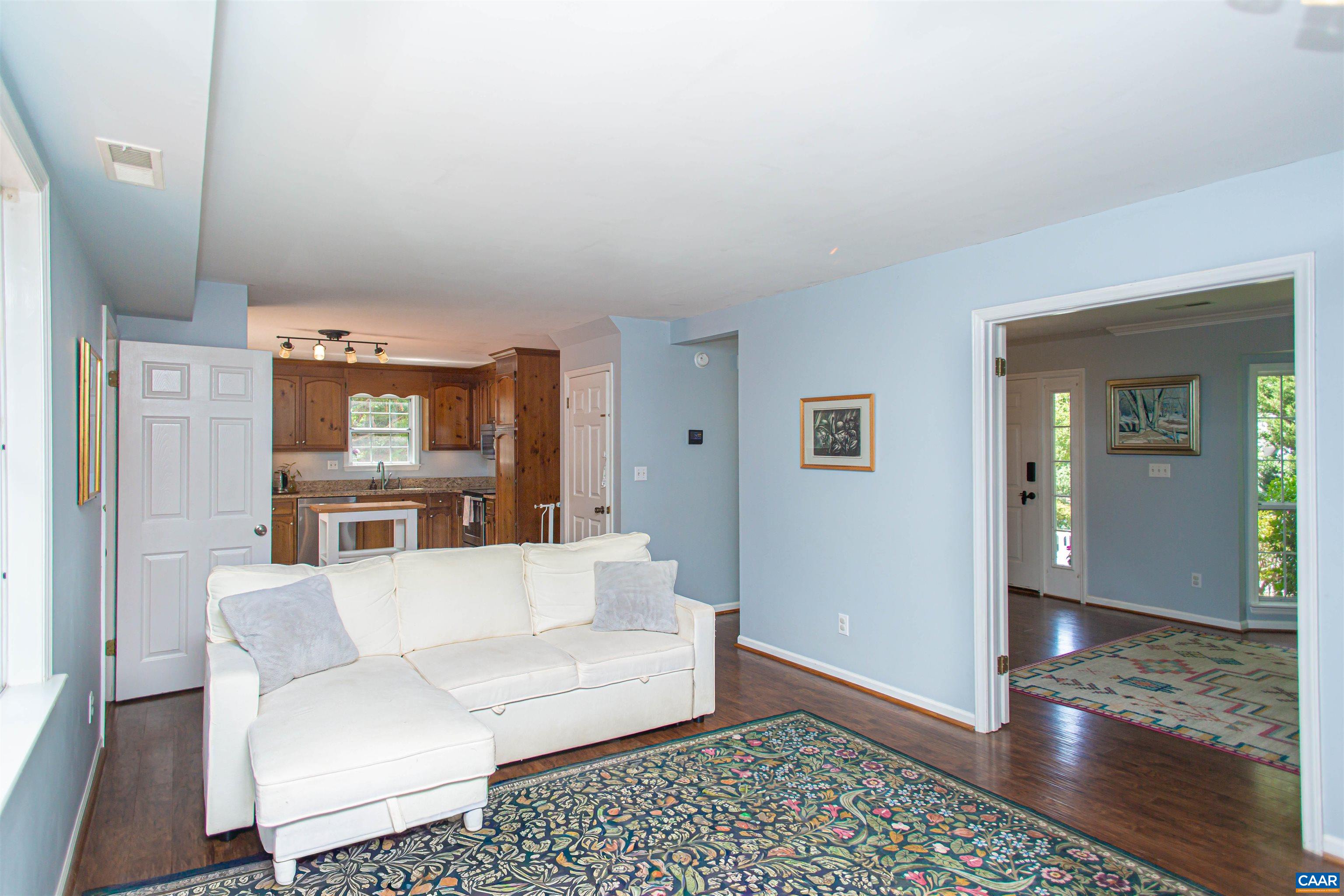 The family room includes built-in shelving & a woodburning fireplace. The family room includes built-in shelving & a woodburning fireplace.
