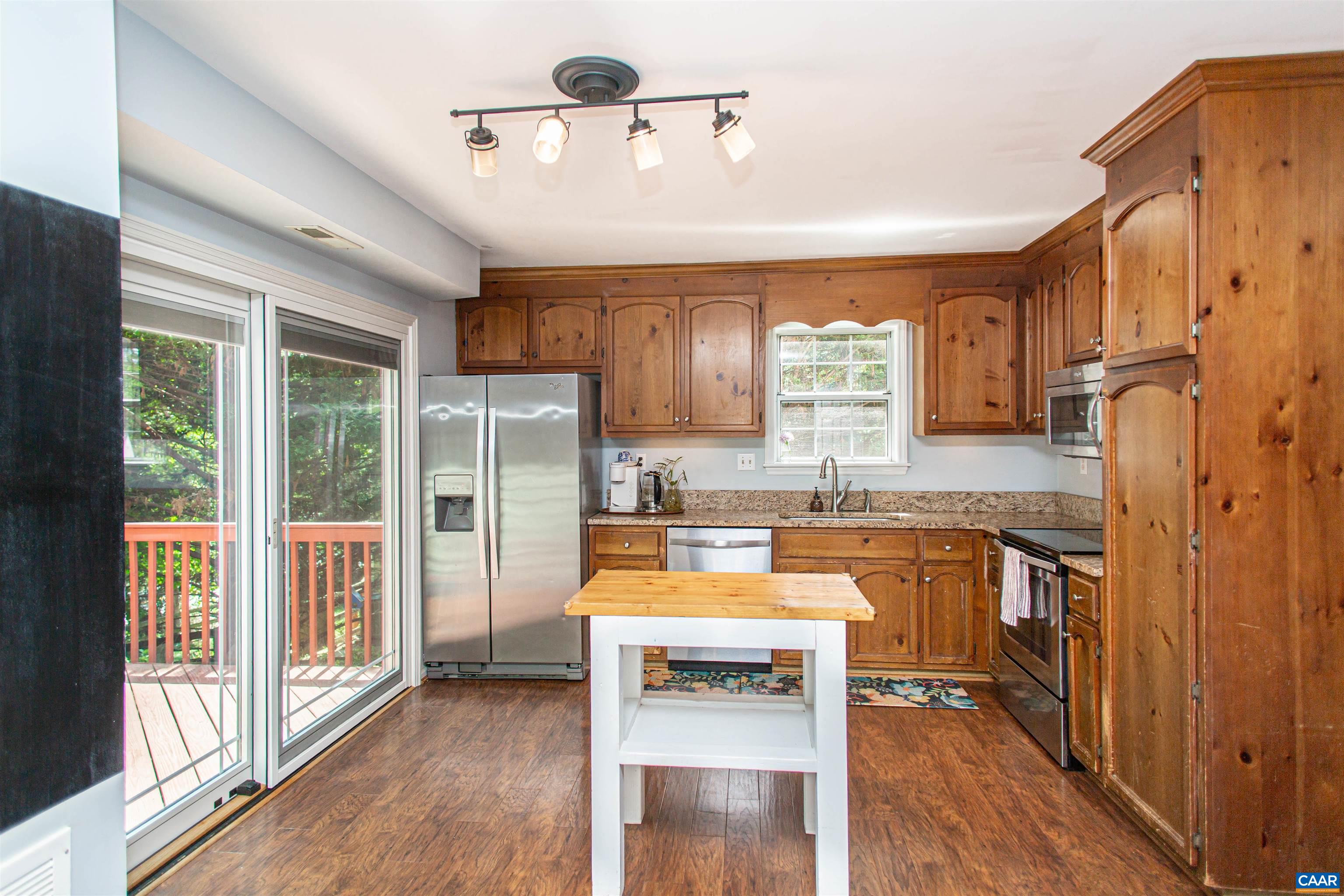 Cabinet-lined kitchen. Cabinet-lined kitchen.