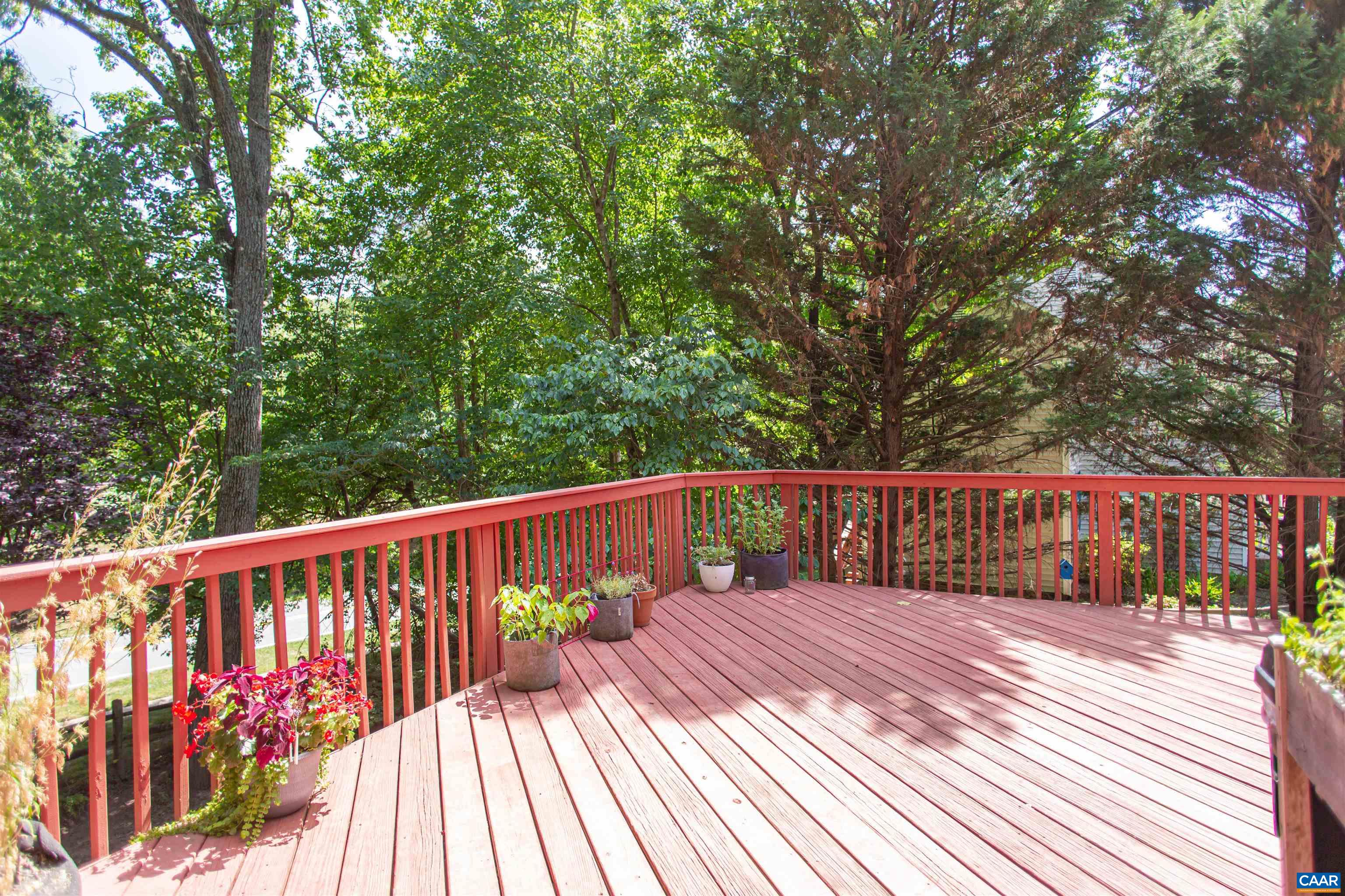 Spacious deck is a perfect spot for dining outdoors, container gardens, & enjoying birdsong in the yard. Spacious deck is a perfect spot for dining outdoors, container gardens, & enjoying birdsong in the yard.