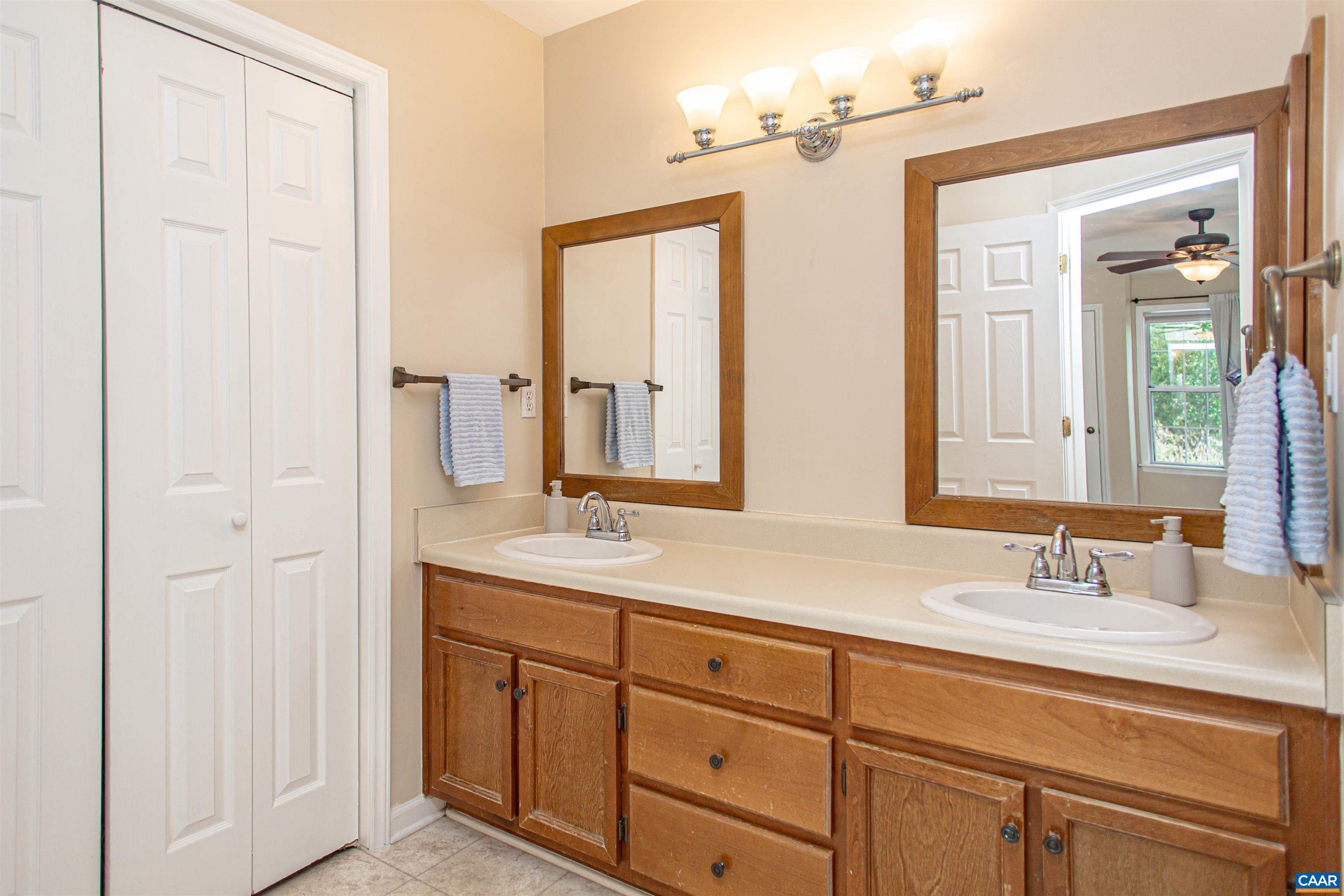 Private primary bath with dual sinks. Private primary bath with dual sinks.