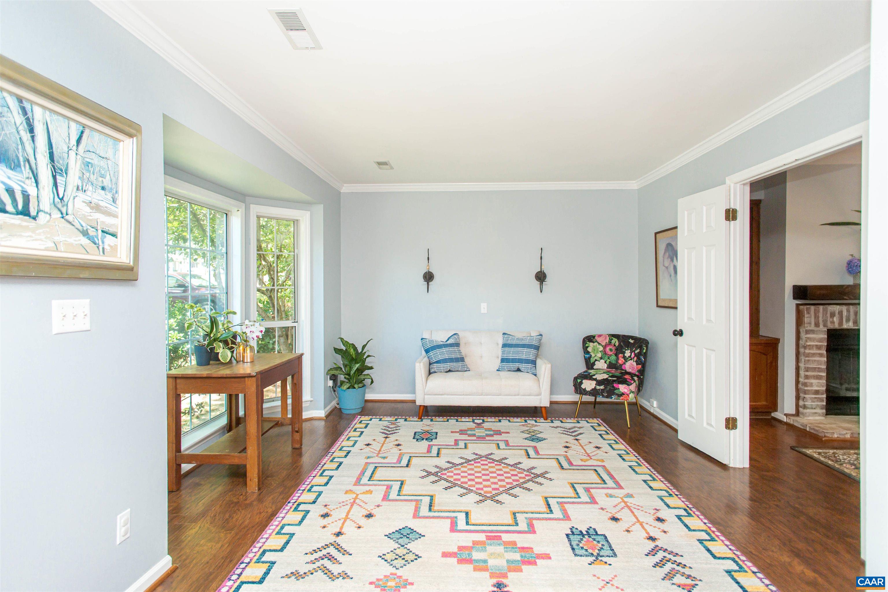 The light-filled living room is sure to impress. The light-filled living room is sure to impress.