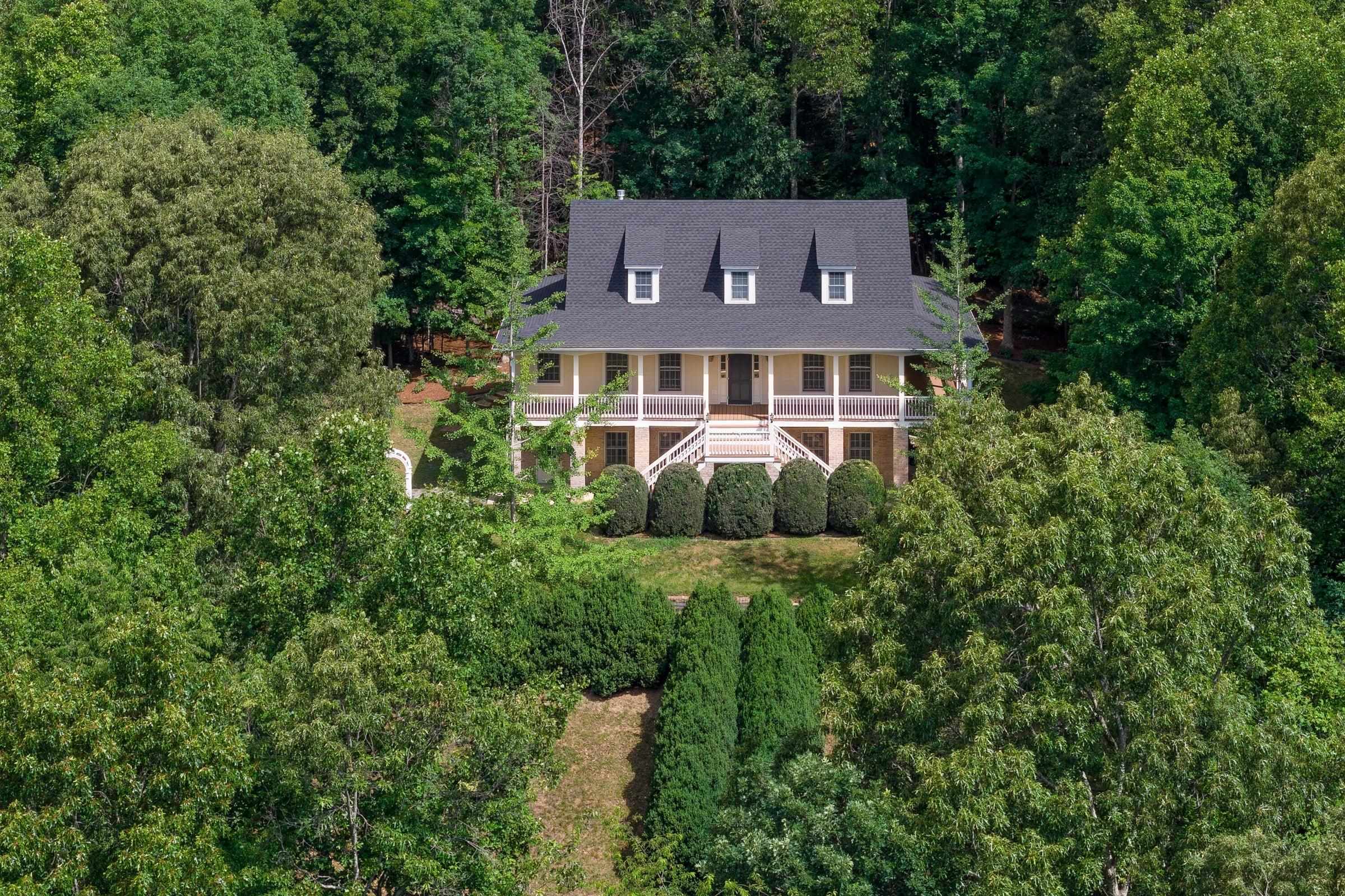 A custom-built home nestled on 7.6 wooded acres. A custom-built home nestled on 7.6 wooded acres.