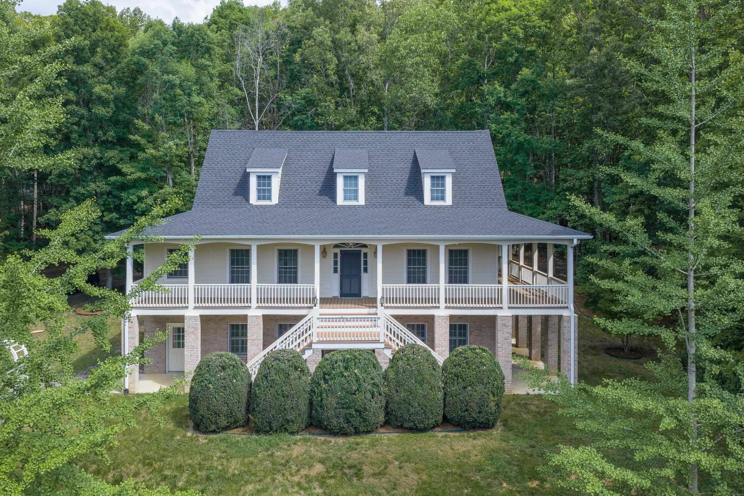 Expansive wraparound porch. Expansive wraparound porch.