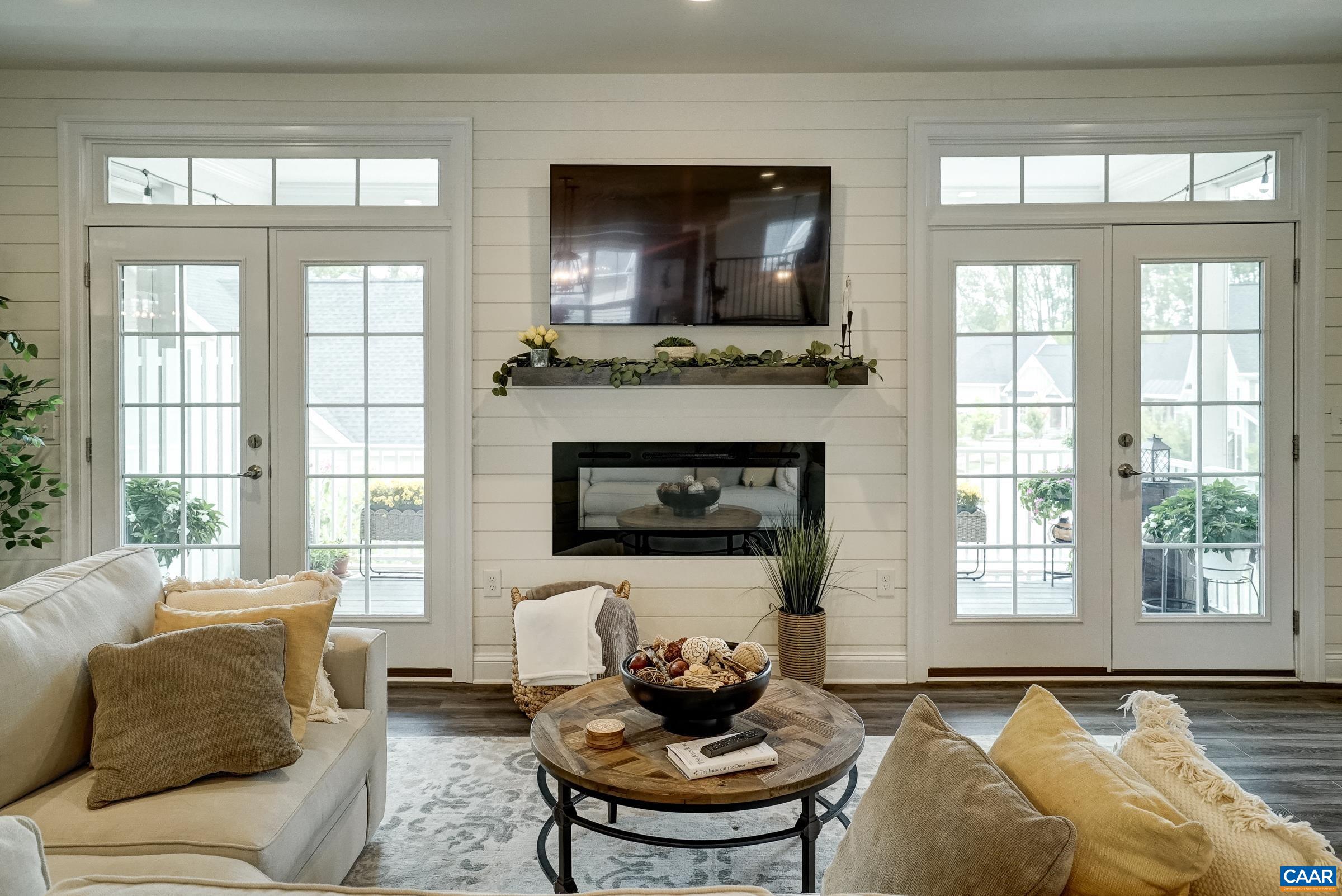 Electric fireplace with floating mantle.