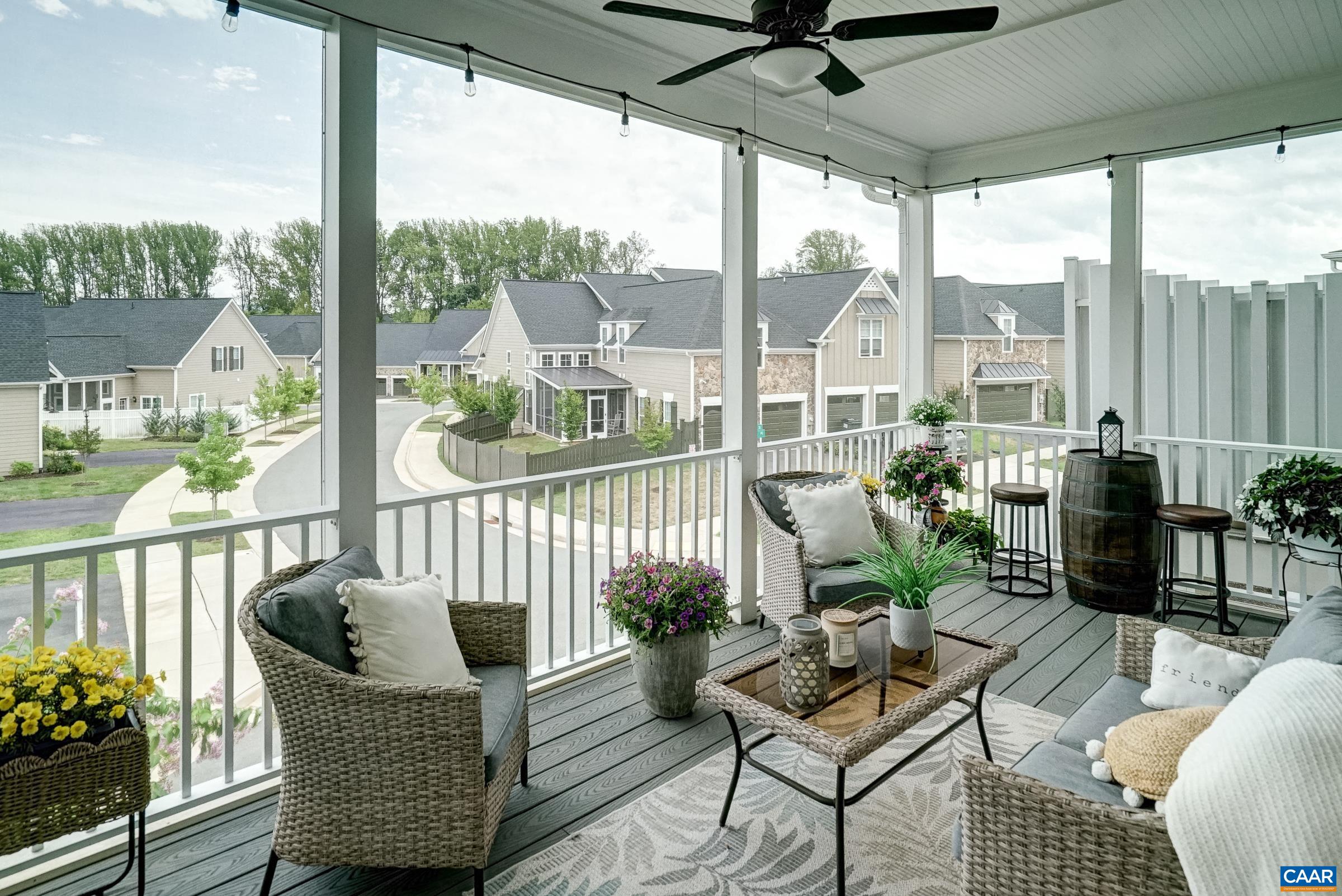 Screened porch with composite decking.