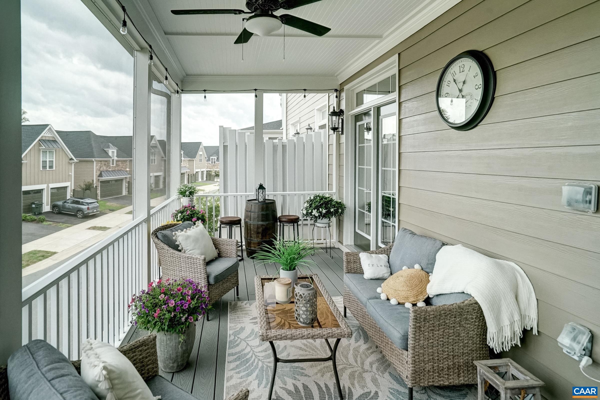 Enjoy outdoor living on the screened porch.