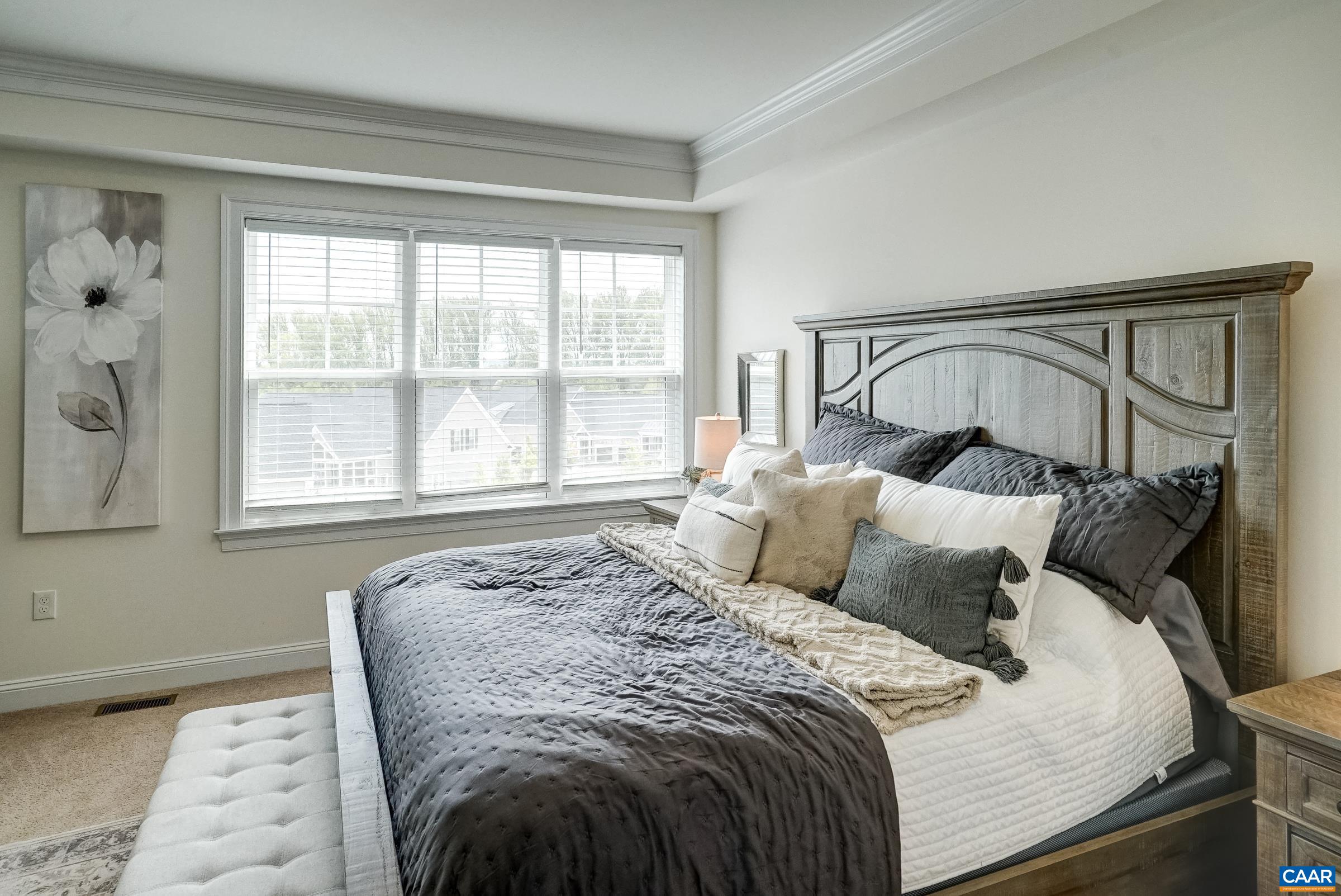 Primary suite features a tray ceiling.