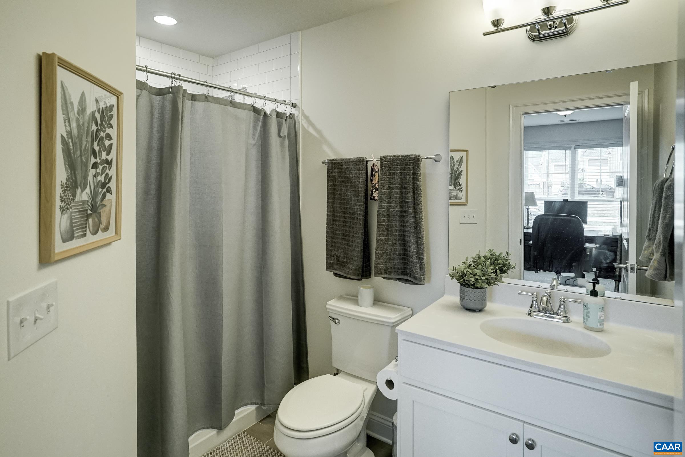 Full bathroom with shower.