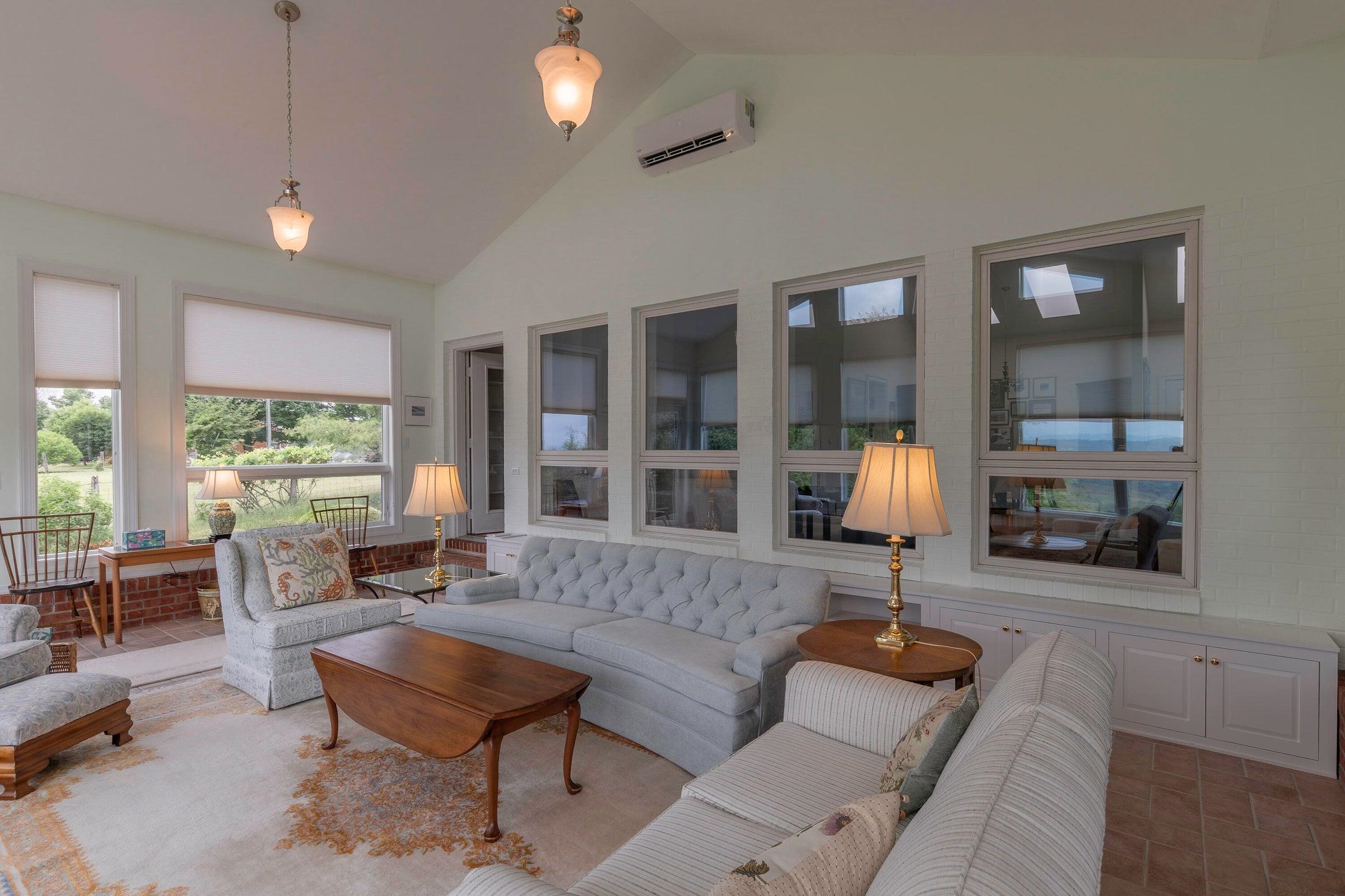4-seasons room is heated and cooled by a mini split. 4-seasons room is heated and cooled by a mini split.