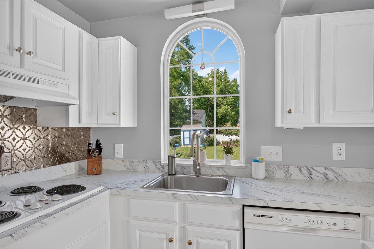 Kitchen with backyard view Kitchen with backyard view