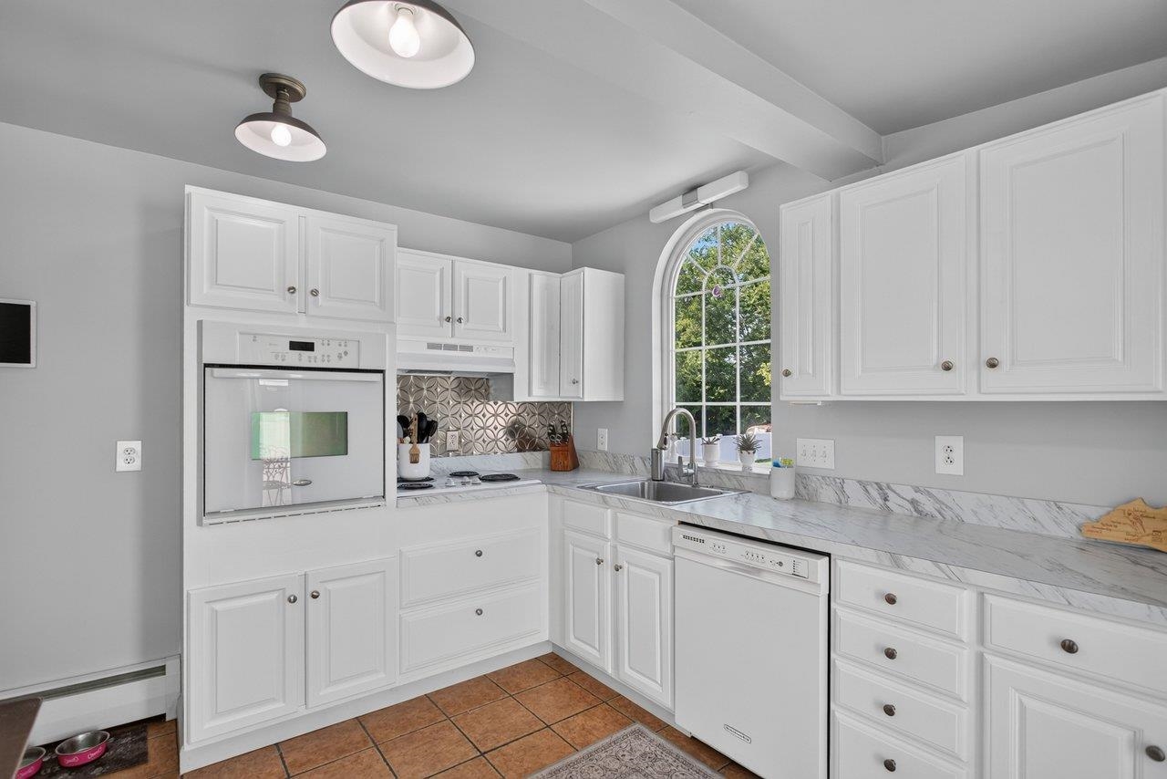 Kitchen with wall oven Kitchen with wall oven