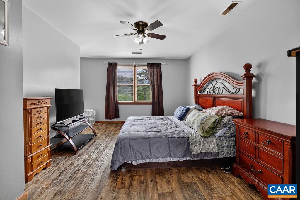 Primary suite offering exceptional storage space.