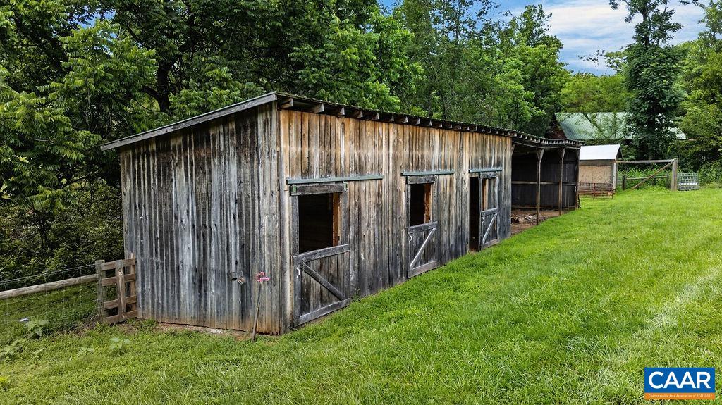 Horse stalls and run-in shed.