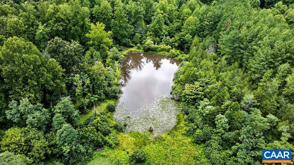 The owners of the property own the water rights to the pond on the neighbors's property so they enjoy access to the pond for fishing.