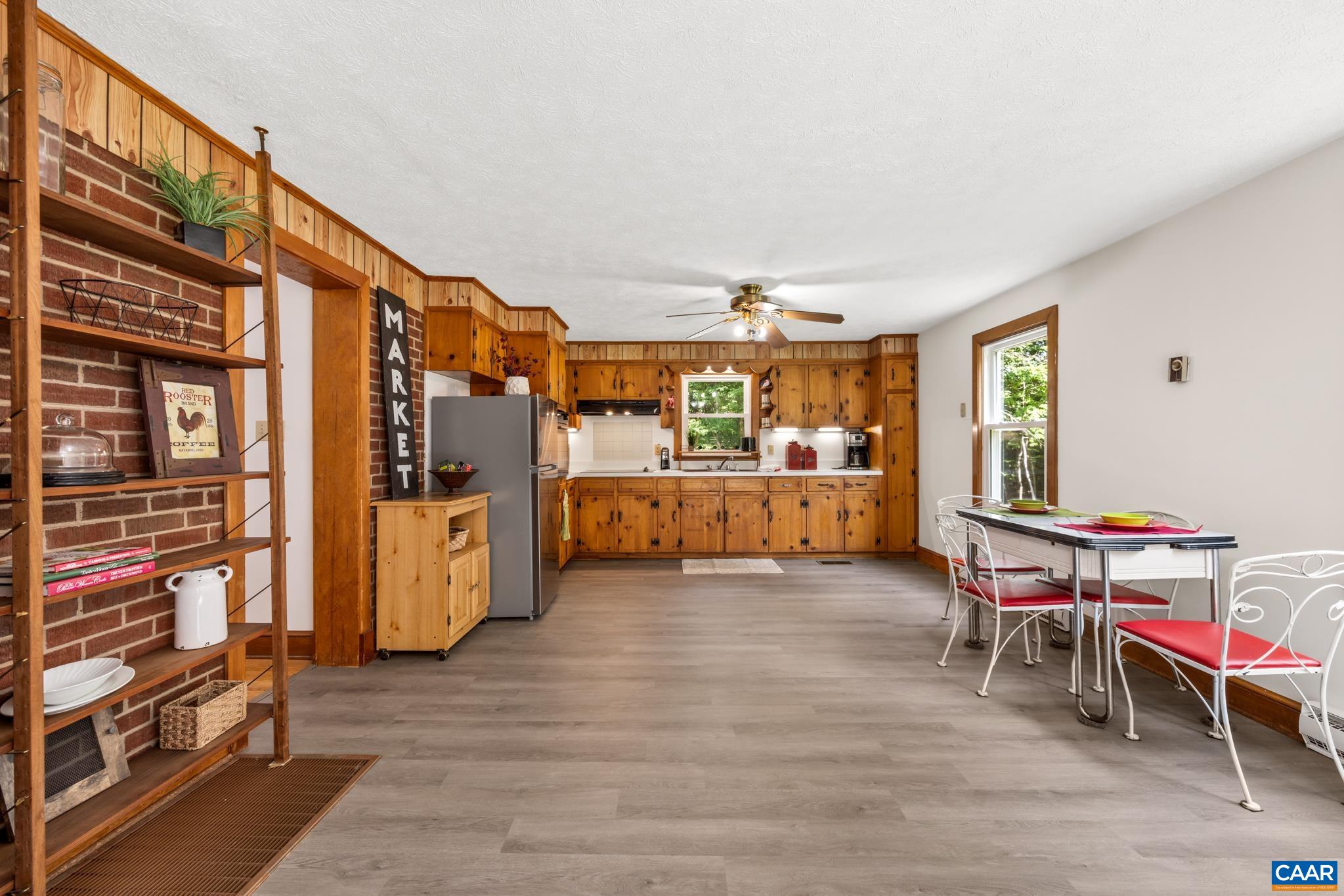 Spacious dining and kitchen area offering plenty of room for gatherings.