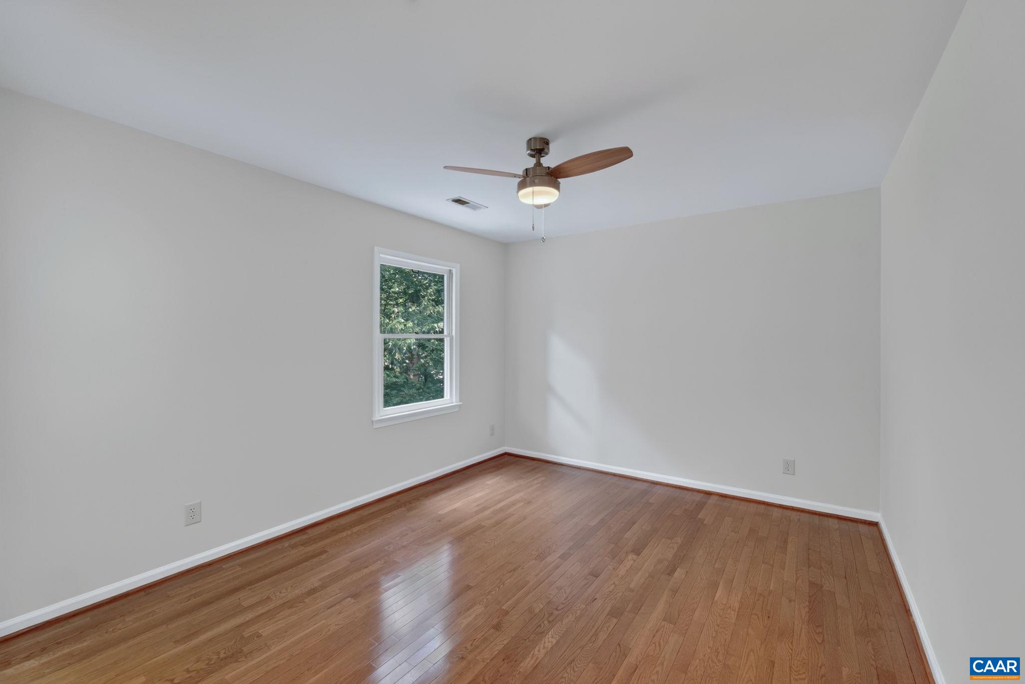 This 3rd bedroom out of 4 resides on the rear of the home AND has a full walk-in closet.