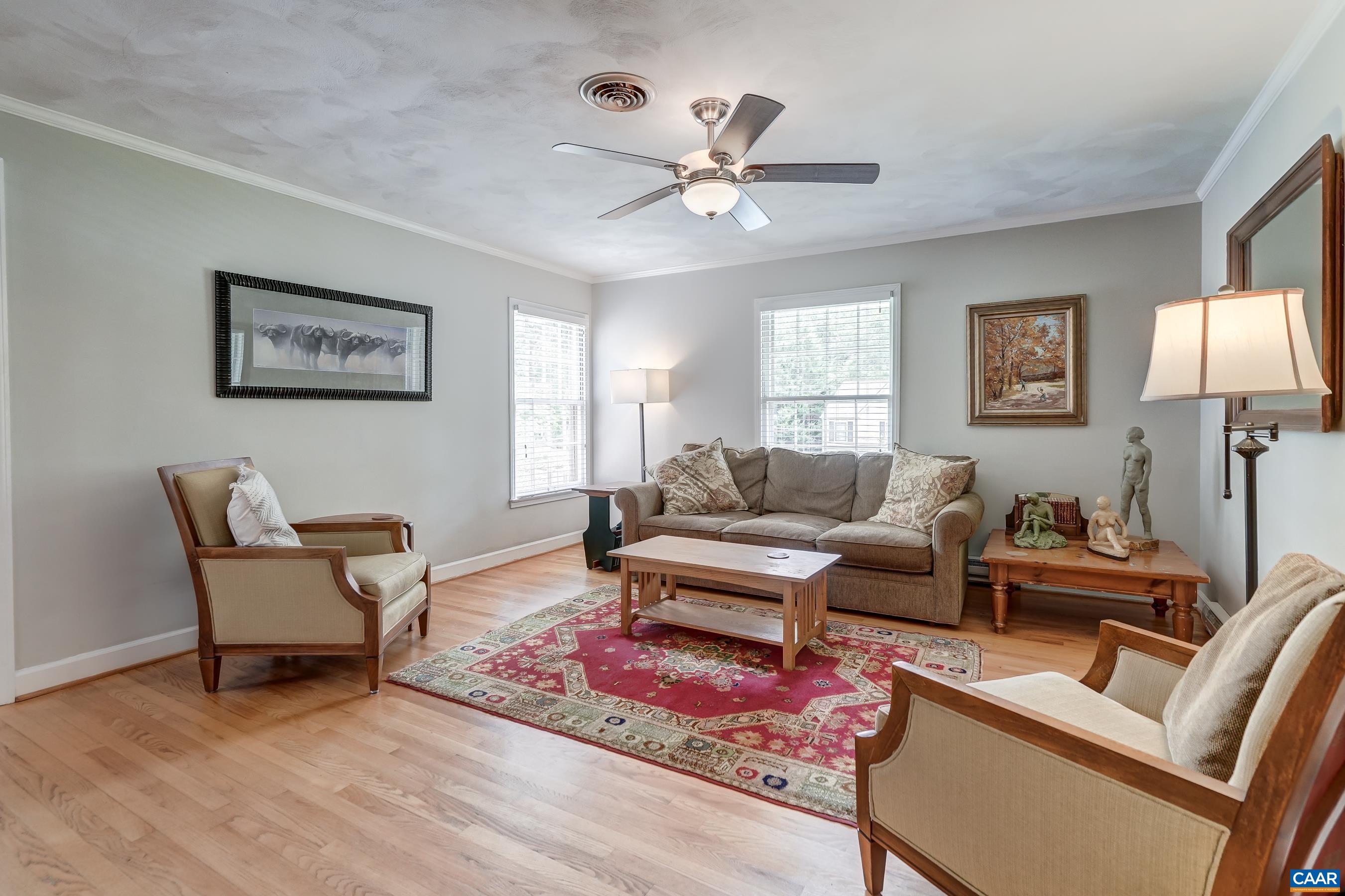 Living room with ceiling fan. Living room with ceiling fan.