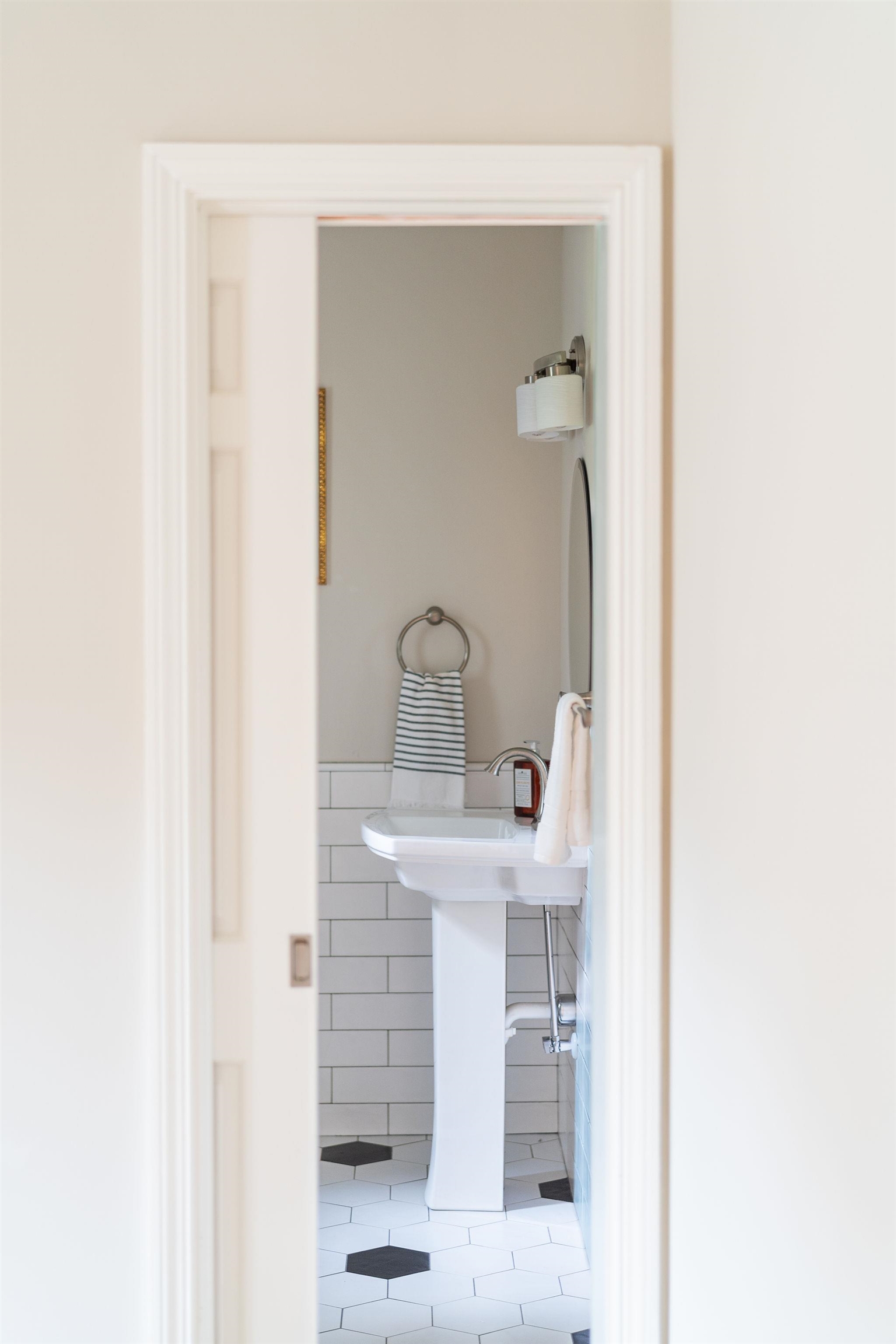 ...pocket door into the half bath ...pocket door into the half bath