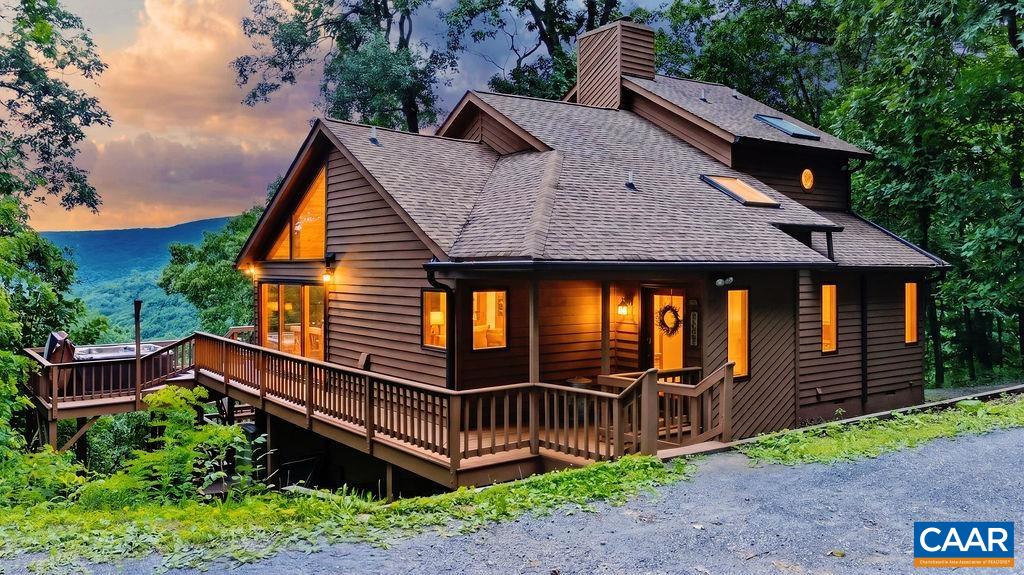 Charming Craftsman home offering a private setting and beautiful year-round southern mountain views. Charming Craftsman home offering a private setting and beautiful year-round southern mountain views.