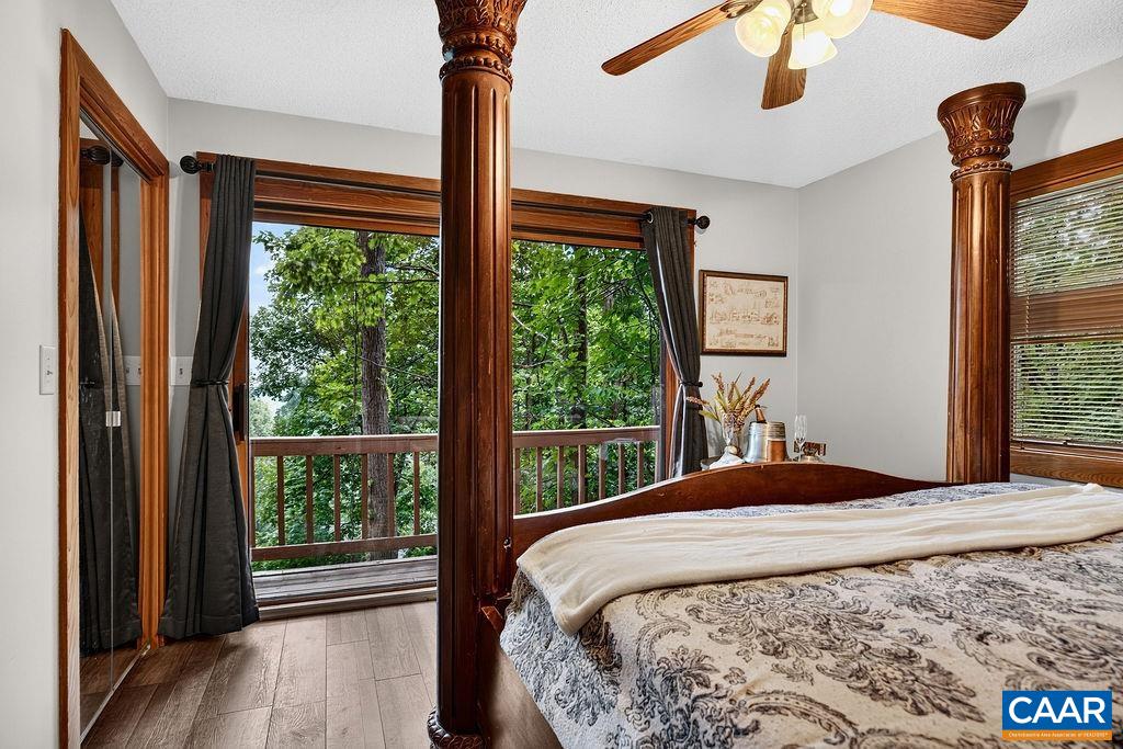 Both main-level guest bedrooms open onto a balcony, providing a peaceful outdoor retreat. Both main-level guest bedrooms open onto a balcony, providing a peaceful outdoor retreat.