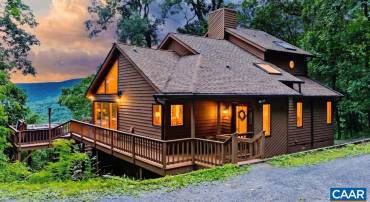 Charming Craftsman home offering a private setting and beautiful year-round southern mountain views.