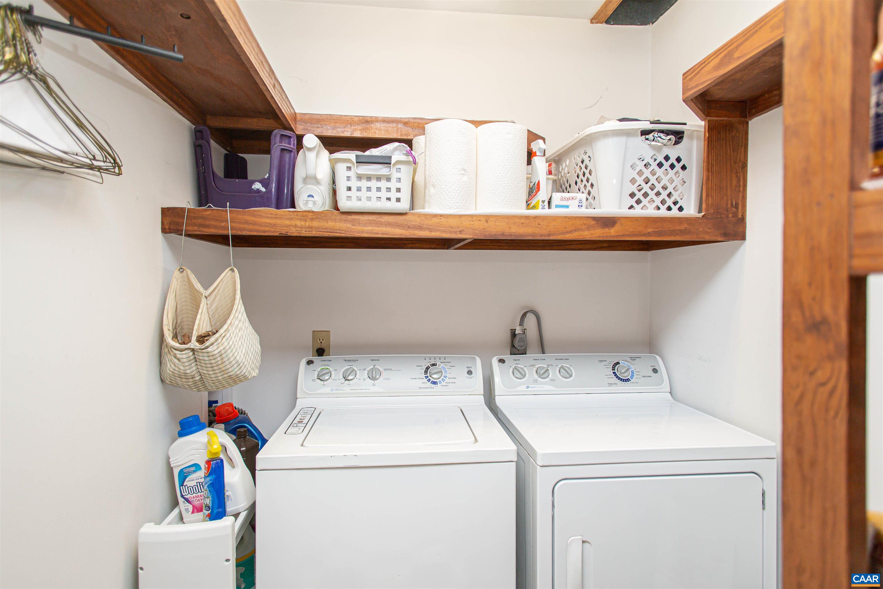 Laundry room & pantry with a convenient laundry chute from upstairs. Laundry room & pantry with a convenient laundry chute from upstairs.